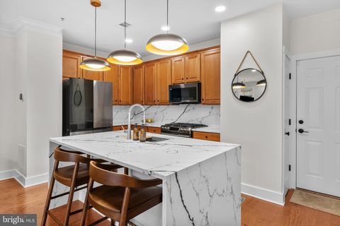 Photo of 413 Cameron Station Boulevard, ALEXANDRIA, VA 22304 (MLS # VAAX2054892)