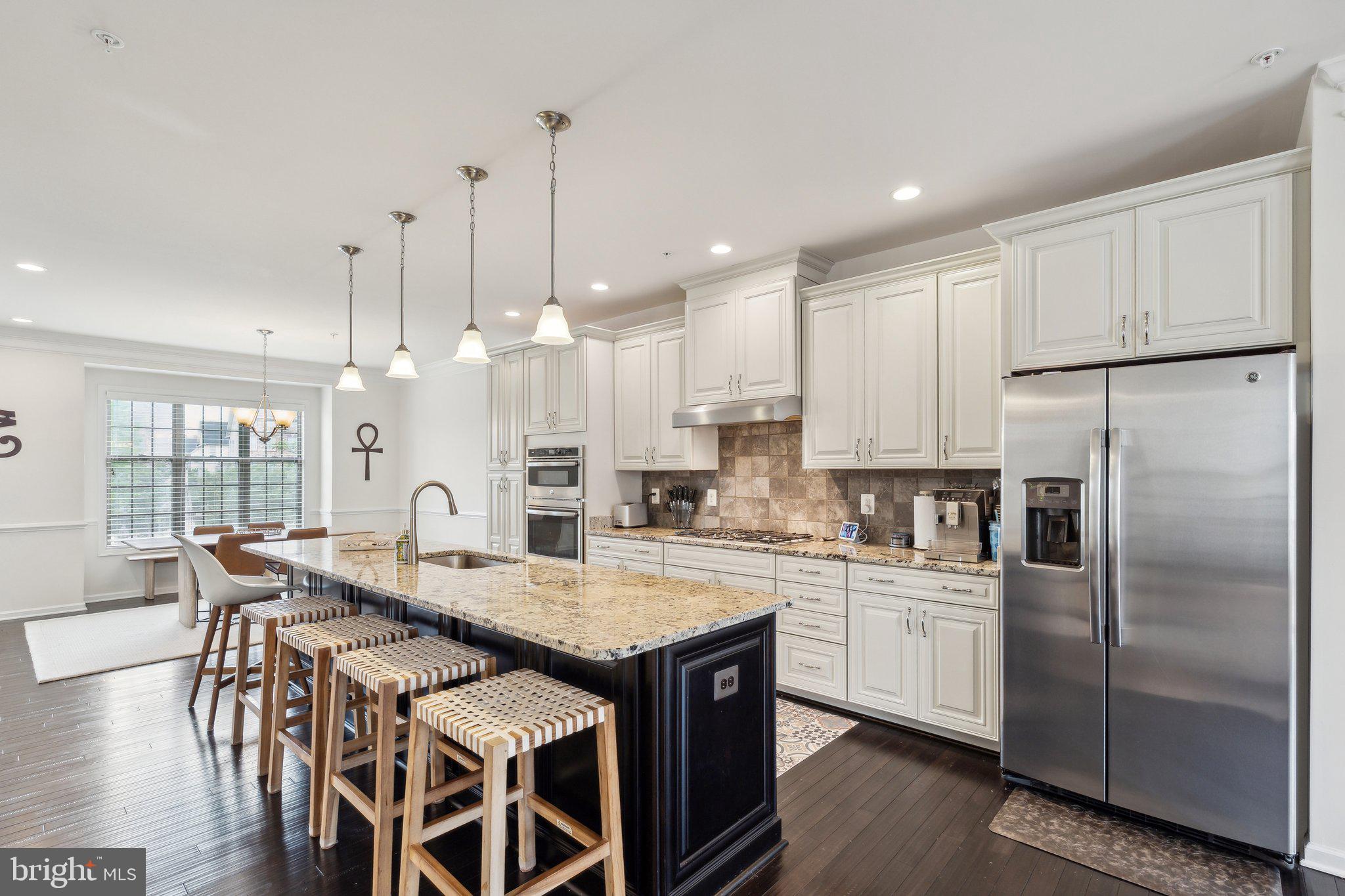 (Public) Sat, Nov 1 2:00 PM - 4:00 PM
(Public) Sun, Nov 2 2:00 PM - 4:00 PM
Price Reduced! Originally listed at $825,000 – now an incredible value for this immaculate four-level townhome with a rooftop deck in the highly desirable Moorefield Green community..
This beautifully upgraded home features gleaming hardwood floors on the main level and all staircases, custom 3" blinds, and a gourmet kitchen with GE Profile stainless steel appliances, gas cooktop, dual wall ovens, and upscale finishes.
The open-concept main level is flooded with natural light and includes a spacious family room, dining area, and access to a private deck with gas line for grilling. The luxurious primary suite boasts custom closet systems and a spa-like bath with dual granite vanities, soaking tub, and designer tile.
The top-level loft provides versatile living space—perfect for a home office, rec room, or gym—complete with a half bath, wet bar rough-in, and walkout to the rooftop deck with a second gas hookup. The entry-level bedroom with en-suite full bath is ideal for guests or multigenerational living.
Additional highlights include a finished garage with epoxy flooring and built-in storage, plus access to Moorefield Green’s premier amenities. Prime location near Moorefield Station Elementary, shopping, dining, parks, and the Silver Line Metro for an easy commute into D.C.
📍 Don’t miss this opportunity—schedule your tour today!