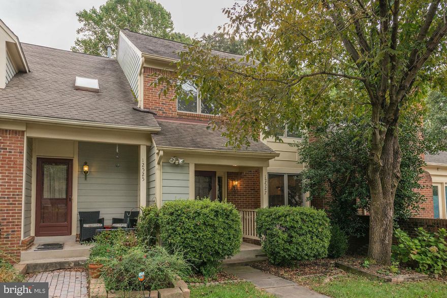 GORGEOUS! 3-bed, 3.5-bath townhome w/potential 4th bed & full bath in basement w/wet bar. Updated eat-in kitchen w/SS appliances and granite. Welcoming living room w/hardwood floors & built-ins by the fireplace. French doors open to serene deck with wooded view. Large master bedroom w/luxurious private bath & jetted tub. Detached 1-car garage. Just minutes to Fair Lakes & Fairfax Corner shopping