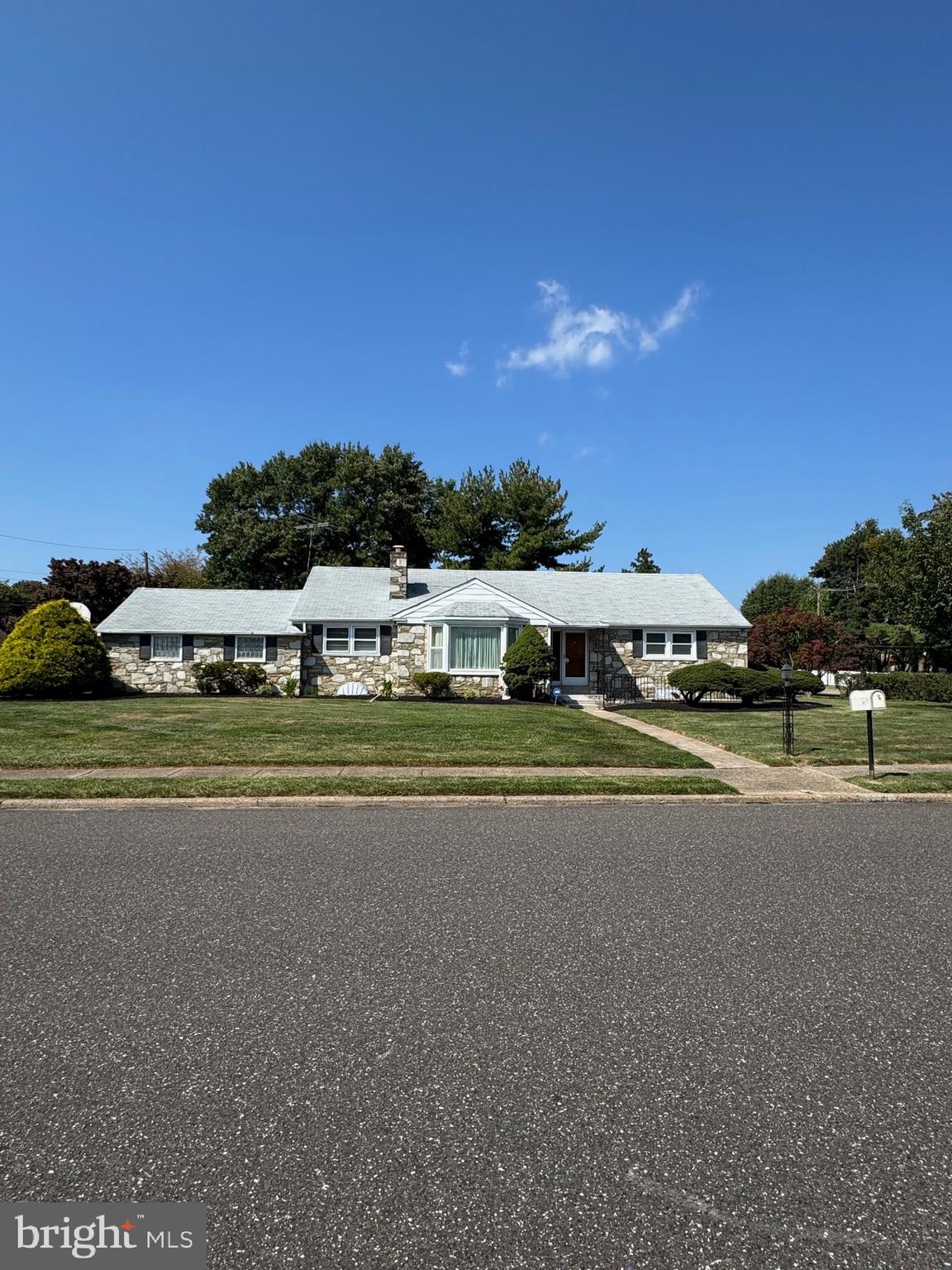 Exceptionally nice rancher in Huntingdon Valley! Welcome to 3990 Berton Road, a well maintained Rancher located in the heart of highly desirable Huntingdon Valley and the award-winning Lower Moreland School District. This spacious residence offers convenience, with a nice layout perfect for one floor living. Walk into a bright and inviting interior with nice living spaces, and windows that give the home a lot of natural light. The Kitchen is large and plenty of cabinet space. The adjoining Dining Area leads to a sun room with a hot tub and large Living Room with a wood burning fireplace create a nice welcoming atmosphere for relaxing or gathering. Two generously sized Bedrooms, including the Primary Suite with a built ins, plus an additional full Hall Bath, offer the option of convenient one floor living. The first floor Laundry Room with utility sink completes the main level. . A standout feature of this home is the Sun-room with a hot tub and plenty of entertaining space year round. The finished Basement expands your living space and is perfect for a game room, play room or entertaining. Enjoy outdoor living in the landscaped backyard with a fenced in garden area. Located close to parks, shopping, dining, and major commuting routes.