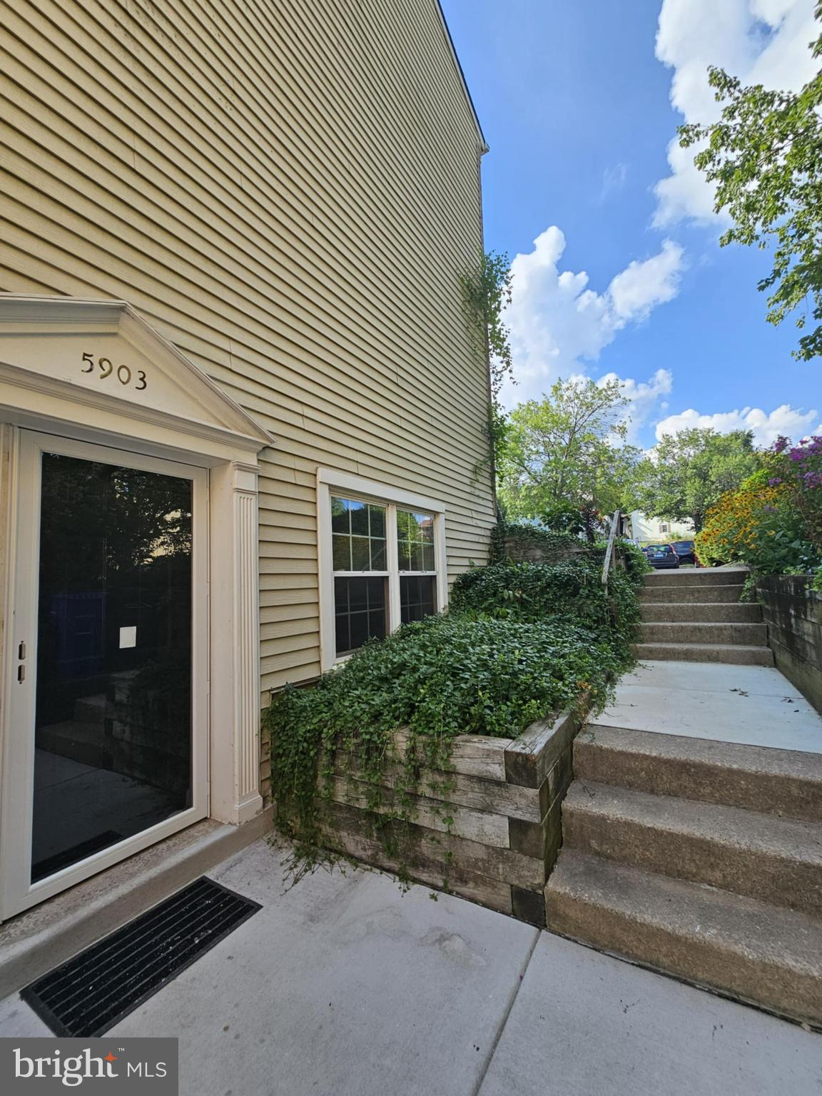 Beautiful light filled ground level condo. 2 bedroom, 2 bath, updated HVAC and water heater. Fenced yard. New waterproof LVP flooring. Freshly painted. comes with 1 assigned parking space and plenty of guest parking.