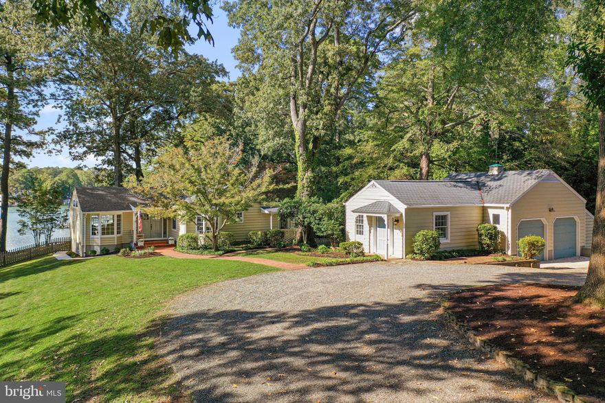 Welcome to 126 Lancaster Road, a rare 2.5-acre waterfront retreat in the heart of Irvington, just moments from the acclaimed Tides Inn Resort. This rambling 1940s cottage has been thoughtfully renovated and offers 3 bedrooms, 2 baths, vaulted ceilings, and a spacious living and dining area framed by a wall of glass doors overlooking Carter’s Creek.  A detached two-car garage with tool shed includes a guest cottage featuring a fourth bedroom and full bath, perfect for overflow visitors or private office space. The property features a large grandfathered pool within the 100-foot resource protection area, offering an exceptional opportunity to reimagine this outdoor space with a pool house, outdoor kitchen, or other resort-style amenities.  The deep-water pier is outfitted with two lifts, power, and water, with over 7 feet MLW to easily accommodate yachts and deep draft sailboats. With frontage on both Lancaster and York Roads, this expansive parcel is one of the few remaining large tracts in Irvington. Mature landscaping and prime water access make it a rare find, offering privacy, convenience, and the potential for future redevelopment.  Showings to begin Friday October 3rd.