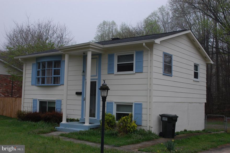 3 Bedroom 2 bath Split Foyer on 1/4 acre lot located near the center of Dale City. Close to shopping and eateries. Home has been cared for and had many upgrades over the years to include most windows replaced,Kitchen makeover with cabinets, countertops and upgraded Appliances. s/s Refrig/Freezer w/icemaker, Smooth-Top Electric Stove, Dishwasher, Garbage Disposal and Countertop Microwave. New Water Heater installed recently. Newer Roof (appx. 4 Years) and Exterior repainted last year. Neutral newer carpet just cleaned on main level and laminated wood flooring on lower level.  Yard has been freshly cut and landscaped. Dog run in Backyard to convey. Fenced in Rear Yard but some damage to back fence due to fallen tree in the past conveys as is. Shed also conveys as is with all contents inside. (no idea of contents)
Washer and Dryer to convey but  strictly as is.