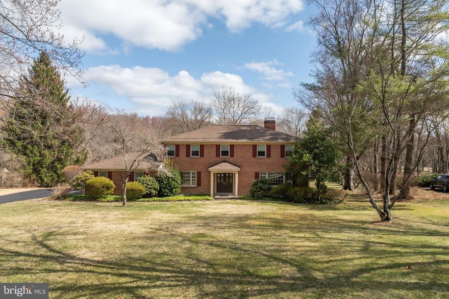 Nestled in one of the most highly sought-after neighborhoods in Newtown Square, 857 Hunt Road offers an incredible opportunity to own a beautiful Colonial in the coveted Radnor Township School District. Set on a picturesque 1.42-acre lot, this 3,120-square-foot home has been lovingly maintained by its original owners since it was built in 1969.

Step through the inviting foyer into the formal living room, where a wall of windows fills the space with natural light, complemented by a cozy fireplace. To the left, the formal dining room provides an elegant setting for gatherings and celebrations.

The rear of the home is designed with comfort and connection in mind. The eat-in kitchen features a bright breakfast area with sliders leading to a three-season room, surrounded by windows to take in the tranquil views. Adjacent to the kitchen, the spacious family room boasts bay windows, a brick fireplace, built-in bookcases, and a charming bar — making it the true heart of the home. A dedicated laundry room and powder room are conveniently located off this space.

Upstairs, the expansive primary suite features ample closet space and a private ensuite bath. Four additional generously sized bedrooms and two full bathrooms complete this level, ensuring comfort and privacy for everyone.

Outside, the sprawling lot offers a serene retreat with endless possibilities for outdoor enjoyment. This prime location provides effortless access to major highways, ensuring a smooth commute, while the charming towns of Wayne and Newtown Square are just minutes away, offering premier shopping, dining, and entertainment.

Don’t miss this rare opportunity to own in such a prestigious and convenient location — schedule your showing today!