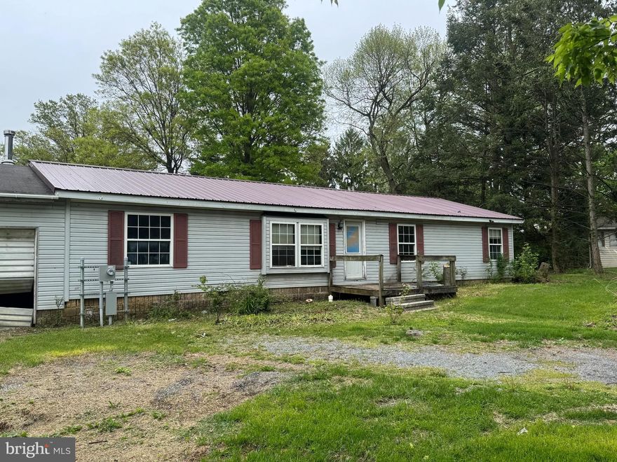 This manufactured ranch-style home sits on a spacious 0.54-acre lot in a quiet, laid-back residential neighborhood. The property requires a full renovation, making it an ideal opportunity for investors, flippers, or buyers looking to customize a home from the ground up. With solid potential and plenty of land to work with, this is a great project for anyone with a vision to transform and add value. The property is sold "AS IS".