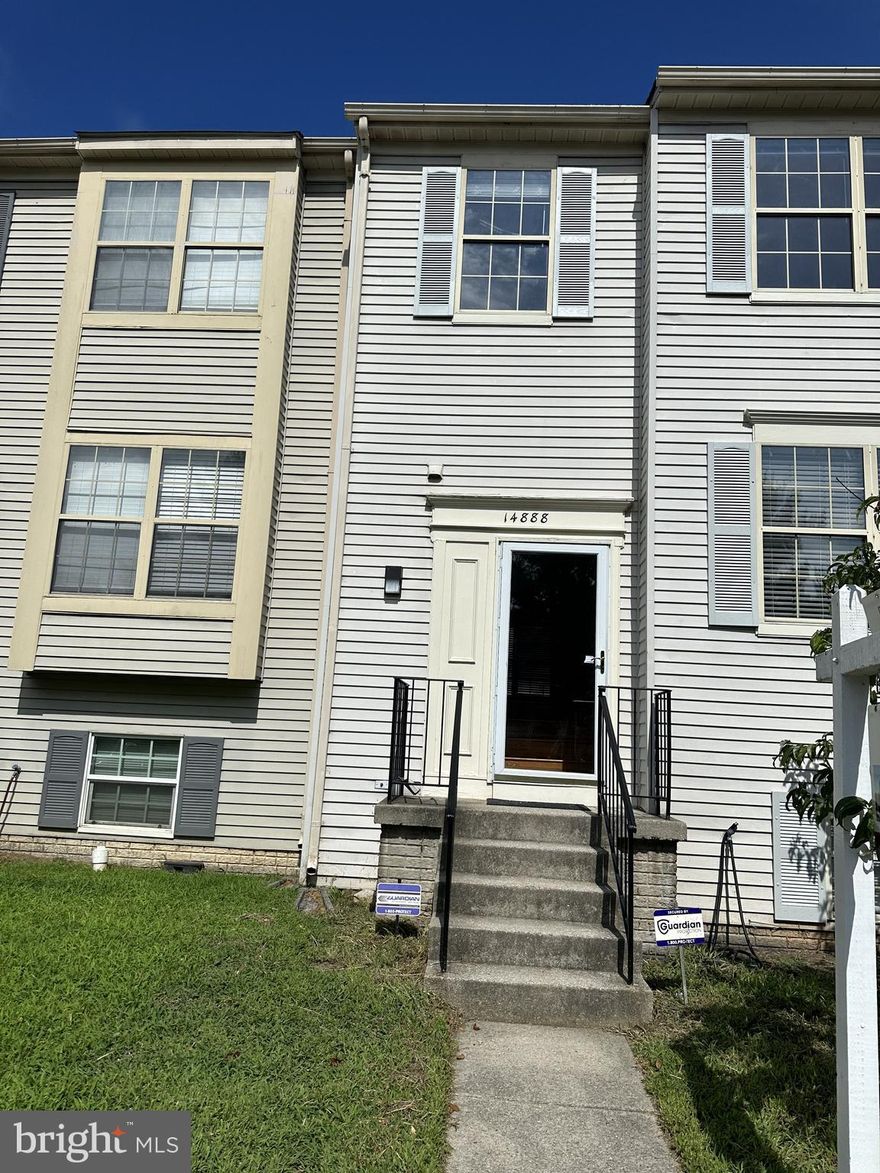 PRICE DROP!!  Won't stay for long at this Price!!!  This is your opportunity! This meticulously maintained 3-level townhome offers comfort, style, and convenience. Situated in a desirable neighborhood, it boasts hardwood floors throughout the main and upper levels. Enjoy the spaciousness of three levels, providing ample room for your family. Step onto the big deck, perfect for relaxing or entertaining guests. The large windows flood the home with natural light, creating a warm and inviting atmosphere. The kitchen features new laminate flooring and freshly painted cabinets, while stainless steel appliances (added in 2022) enhance both functionality and aesthetics. The basement includes a full bedroom and bathroom, ideal for guests or a home office, with newer carpeting in the common room. The spacious master bedroom boasts two windows, allowing sunlight to stream in, and an attached bathroom for your convenience. Recent updates include freshly painted walls, a new roof (installed in July 2023), an upgraded water heater (also from July 2023), New Roof (2023) and modern washer and dryer (added in 2021). Don’t miss out on this fantastic opportunity! Schedule a viewing today and make this townhome your own