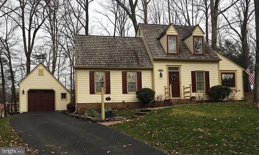 Welcome to this charming 4-bedroom, 3-bathroom home nestled at the end of a quiet cul-de-sac in the heart of Montclair. Featuring a detached garage and surrounded by mature greenery, this home offers both privacy and timeless appeal.   Improvements; Carpet, Paint, and Built-in microwave 2026, LPV Flooring living room, hall and primary bedroom 2025, Roof 2021, and Fence 2020. 

Step inside to a spacious, sun-filled living area highlighted by LPV and hardwood floors, large windows, and a striking double-sided fireplace—perfect for everyday living and effortless entertaining. The main-level primary suite offers an en-suite bath and generous closet space. Two  bedrooms upstairs share a private full bath, while the lower-level bedroom (NTC) full bath provides an ideal space for guests, extended family, or flexible living arrangements.

The lower level also features a recreation room, home office area, and ample storage. Outdoors, enjoy a private fenced backyard with a deck, plenty of room for pets, and space to create a garden retreat.

Additional highlights include a dedicated laundry area, a built-in shelving alcove, and a separate storage room. Conveniently located near community schools, public library, shopping, and dining, with easy access to bus stops, commuter parking, Quantico Marine Base, Fort Belvoir, and Washington, DC.

This home offers the perfect blend of tranquility, space, and convenience—don’t miss your opportunity to own this Montclair gem.

Note: Liberty Colonial Safe conveys with home; located in the storage area (small black safe does not convey.)