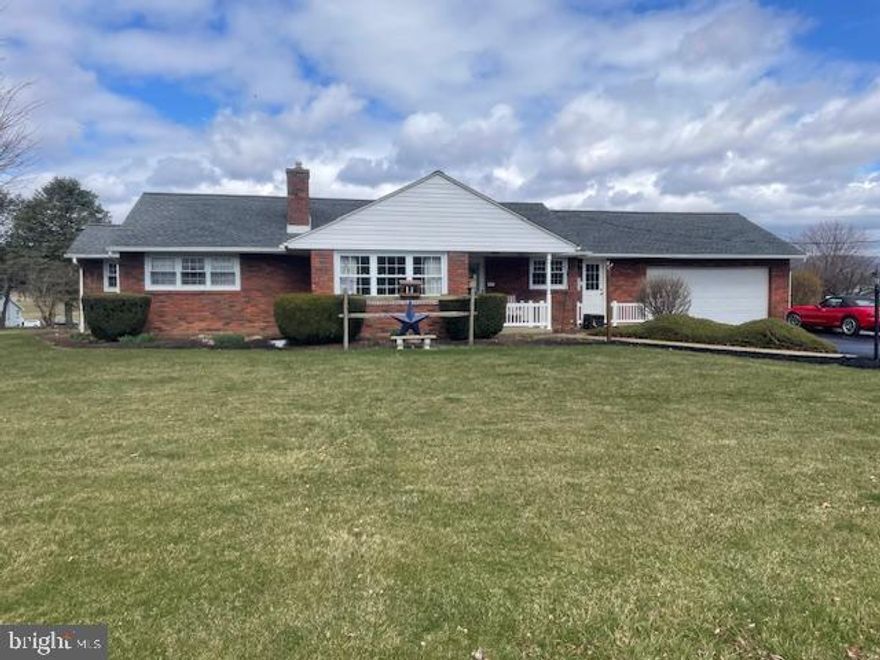 Beautiful brick ranch home in the quaint village of Belleville. Situated on a .66 acre corner lot with a spectacular view of the mountains. This home offers 3 bedrooms, 1 1/2 baths with hardwood floors, 2 fireplaces, main floor laundry and a 2-car attached garage. The full finished basement doubles your living space and allows for plenty of room to enjoy a game of pool or just chill with some popcorn and a movie.
The spacious 3-season room, large outdoor patio and inground pool provides the perfect place for entertaining family and friends.   Don't miss out on this one. Call today for your personal tour!