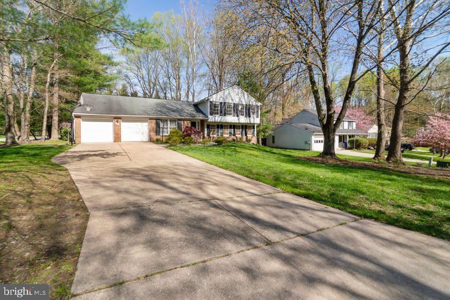 Rare opportunity to own a spacious, well-maintained single-family home on picturesque Firefly Way in Dorsey’s Search! Relax on the brick paver patio overlooking mature trees and an oversized corner lot with a peaceful, park-like setting—just steps from walking paths and all that Columbia has to offer. Inside, a welcoming entry with durable laminate flooring leads to formal living and dining rooms, an eat-in kitchen with a new backsplash, and a bright sunroom with cathedral ceilings. Need a home office or guest space? The main-level den with a full en-suite bath (updated) and adjacent family room with a wood-burning fireplace offers endless flexibility. Upstairs features a large primary suite with ample closet space and a private bath, plus two generously sized bedrooms and a full hall bath. Additional highlights include new recessed lighting, a beautifully updated lower-level full bath, and over 2,800 square feet of living space. Conveniently located with easy access to Baltimore and DC, close to shopping, top-rated Howard County schools, and just steps from the bus stop—this home is ready for your personal touch!