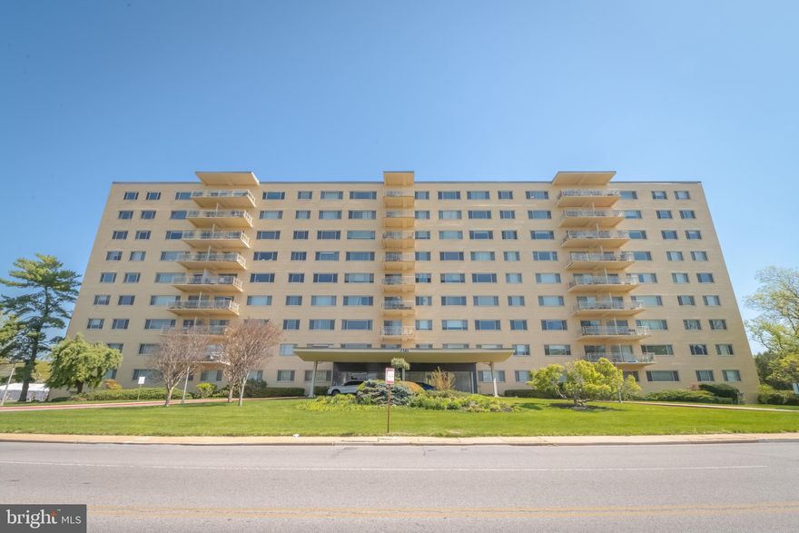 Welcome Home to 7121 Park Heights Ave #406.  This open floor plan condo features large windows allowing for tons of natural light and plenty of opportunity to admire beautiful sunsets! This spacious 2 Bedroom, 2 Bath Condo on the 4th floor features a full service building with a 24 hr reception desk, parking lot, answering service, Shabbat Elevator, Porters, and a Community Room. In unit features include updated eat in kitchen with white cabinets, black stainless appliances, updated back splash, and gas cooking.  The large primary suite features large windows and a en suite with private vanity and changing area. The laundry room has an updated washer/dryer featuring a dual vented dryer and freezer.  One of the nice features is the abundance of closet space.  The unit includes a storage locker in the Basement. The building condo fee includes heating, A/C, gas, electric, and cable. Easy access to shopping, restaurants, and 695.   Schedule your private showing today!