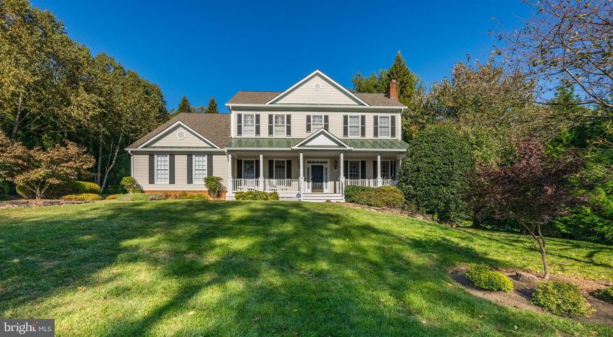 Charming farm-house style colonial located on the Falls Church/McLean border with convenient access to downtown McLean, Tysons, Falls Church and N Arlington.   Exquisitely maintained, this home features 5 bedrooms and 4.5 baths with over 5,000 sq ft of living space on three levels.  A modern, open floor plan features 10’ ceilings on the main level, chef’s kitchen with stainless-steel appliances, abundant storage (including a butler’s pantry), spacious informal dining area and family room with wood-burning fireplace (gas logs installed).   The private rear deck overlooks the large backyard screened by mature landscaping.  The formal living room features beautiful crown molding and an additional wood-burning fireplace.  An office is tucked away in the back. Upstairs has newly installed hardwood floors in the hall and primary suite and new carpet in the secondary bedrooms.  The primary suite includes a cozy gas fireplace, spacious dressing area, walk-in closet and bath with dual vanities, walk-in glass shower and jacuzzi tub.  Three additional bedrooms and two baths are also on the upper level.  The walk-out lower level has been freshly painted and offers a flexible floor space with room for reading, playing or watching television.  A fifth bedroom and full bath can also be found here.  All sited on a beautifully landscaped  ½ acre lot.  Additional updates to this home include:  rebuilt front porch with composite decking (2022), hot water heater (2022), main-level HVAC (2022), Hardie plank siding, gutters & downspouts (2020), French drain in backyard (2020), roof (2018).  McLEAN SCHOOLS:  Haycock ES, Longfellow MS, McLean HS.