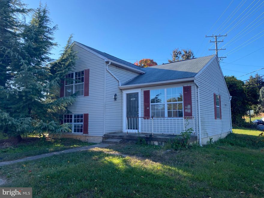 Investment opportunity for a fixer-upper!  Original owner home needs complete renovation.  Priced to sell because of condition.  Split level home with three levels.  Living room and eat-in kitchen on main.  Large primary bedroom with walk-in closet on upper along with  a full bath and second bedroom.  Basement is unfinished but has a second full bathroom, rec room or third bedroom and utility/laundry room.  There is room for a deck off the kitchen and a quarter acre yard.  This is a cash or hard money purchase.  Entirely AS IS.  There's good value here but be prepared to roll up your sleeves and work for it.