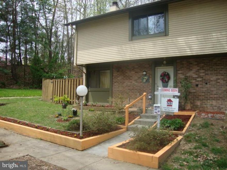 Well maintained and charming End unit townhouse in Burke Centre.   Beautiful molding throughout the house.  Large living room to the left as you walk-in.  Large kitchen with Pergo floors and stainless steel appliances. Separate dining off kitchen. Updated bathrooms.  Fully fenced-in side yard with wood floor and nicely landscaped.  Close to shopping, Amtrak, VRE and next to Fairfax County Parkway