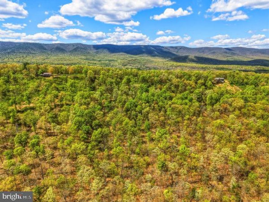 Lots 16 & 17  - Views Beyond Belief "  Set along the highly sought-after South Supinlick Ridge Road, these two adjoining parcels offer a rare opportunity to own a total of 6 acres in one of the area’s most scenic settings. Positioned on the east side of the ridge, the property captures sweeping views that stretch for miles. Don’t forget those stunning red sunrises! Each lot consists of 3 acres, providing flexibility for building 2 homes, investment, or simply creating a private mountain retreat with room to spread out. The elevated setting enhances both the views and the sense of openness, while still offering a peaceful, tucked-away feel. Located within the Alpine Acres Subdivision, the property offers a valuable convenience not always found with land in this area. The ability to connect to a community well system (connection fee applies), maintained by Valley Water.  A septic system will be required, as is typical for homes along S  Supinlick Ridge,. Having access to a shared water source simplifies the building process and reduces upfront costs. Just a few miles from Bryce Resort, the property is ideally positioned for both personal enjoyment and investment potential. Short-term rentals are allowed, making this an excellent opportunity for those looking to build a vacation home, rental property, or a combination of both. For those seeking even more space or a larger investment opportunity, an additional adjoining pair of 3-acre
lots is also available, offering the potential to expand to a full 12 acres along the ridge.
Whether you are looking to build now or secure land for the future, this property combines natural beauty, flexibility, and a prime location along one of the region’s most desirable ridge roads.