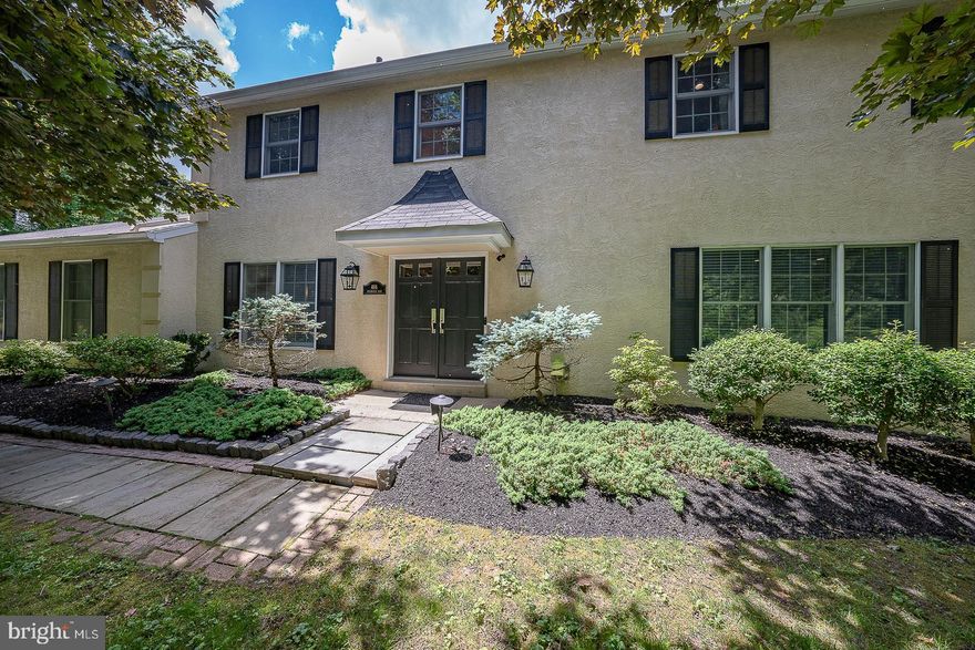 Welcome to this stunning move in ready home in the desirable neighborhood of Beaupre in the heart Radnor Township.  Set back from the road you will approach this lovely 4 bedroom/ 2.5 bath home and notice its tranquil setting.  Enter the foyer of this center hall home and find french doors on either side of the foyer inviting one into the dining room with its hardwood flooring and crown and chair molding, and on the opposite side an expansive living room currently being used as an office with hardwood flooring and additional moldings.  The sunny kitchen is a cooks delight with top of the line appliances including (2) Fisher & Paykel dishwasher drawers, double Fisher & Paykel wall ovens,  GE Monogram stainless refrigerator, and a 5 burner gas stove. The beautifully updated kitchen opens directly to the family room so you can enjoy the travertine wood burning fireplace which is flanked by custom built in shelving.  Two sets of sliding doors from both the family room and kitchen provide access to a private covered patio where one can enjoy relaxing or grilling with a direct gas line run to the grill.  The laundry room has a double load washer and dryer and is accessed off the kitchen or from the 2 car attached garage and houses an updated powder room.  Ascend the staircase and find four nice size bedrooms each with hardwood flooring and crown molding.  The expansive primary suite has an updated bath with double sinks, a whirlpool tub and a walk in shower complete with Grohe fixtures and has 3 closets.  The updated hall bath completes the second floor.  Newer windows, newer water heater (2022), generator, full basement with heat and high ceilings if desire to finish, and 2 car attached garage with additional storage area- all in Radnor Township in the coveted community of Beaupre.