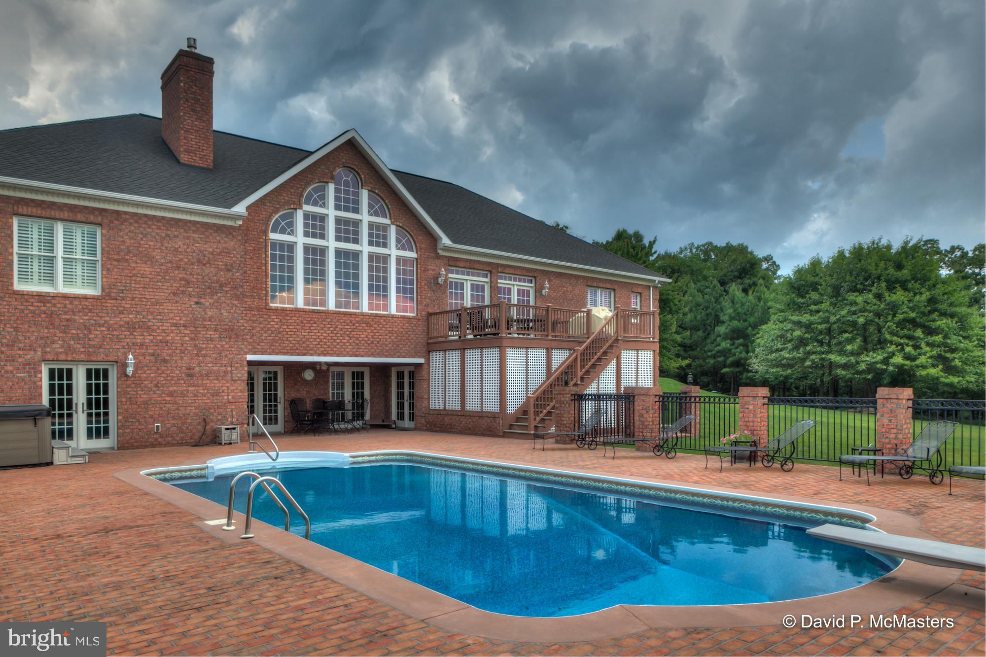 Truly exceptional brick rancher with big finished basement and inground pool in gated community. Bring the chickens and the cows. HORSE BARN, paddocks, in-ground pool 18x36. 2 Fire Places, 8p hot tub. Mountain views. Huge master suite w/ built-ins. Gourmet kitchen, granite. GREAT BASEMENT w/wet bar, huge rec room, FP, built-ins. Entire home is gorgeous, highest quality materials, immaculate. Peaceful & pleasing to the eye, inside and out. 12 min to I-81, 20 to MARC Commuter Train to DC. BIG PRICE DROP. Absolutely Stunning. Just for fun, we just added some lovely Christmas decoration photos.