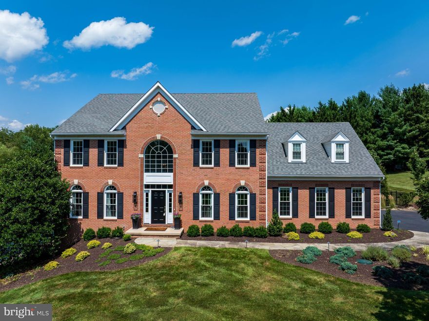 A house is made of bricks and beams, but a home is made of hopes and dreams.” Welcome to the home at 3005 Averley Road, which has been updated inside and out for 2025. The line between everyday living and luxury disappears the moment you walk through the new Anderson front door into a home that’s been renovated from top to bottom.  Extensive molding on every level, updated bathrooms, and a kitchen that caters to the chef in you, look into the two-story family room—bathed in natural light—with a new coffered ceiling, craftsman-style wall molding, gas fireplace, and sweeping views of the extensive backyard landscaping. Whether it's daily meals under the new beadboard ceiling in the breakfast room or holiday gatherings in the living room and library with new hardwood flooring or the elegant formal dining room, this space is a showstopper. Upstairs, retreat to your primary suite sanctuary with a serene sitting room, two-sided fireplace, and a new private balcony that dreams are made of. The updated master bath offers a soaking tub, double vanity, and tiled shower. Three additional, beautifully appointed bedrooms complete the upper level—each crafted with crown molding and new paint. Then there’s the fully finished lower level. Call it a party zone, a game room, or a fitness hub —it’s all of the above. It features a dedicated high-end 4K home theater with a 120” screen and its own heating/cooling system, a bar with a new fridge and pizza oven for movie night, a full bath, and new brick accents for an exercise space, game room, or flex bedroom. The high-efficiency furnace in 2024 comes equipped with an auto humidifier, an electronic air cleaner, WIFI thermostats, and a tankless water heater fed by a new well pump. The expansive maintenance-free deck in 2023 overlooks the newly fenced saltwater chlorinated pool fitted with a new liner in 2024. Morning coffee with the sunrise, summer BBQs by the pool, late-night swims under the stars; this is the lifestyle that many dream of. Set on two private acres in Holbrook Estates, this is what coming home should feel like as you pull into the three-car garage with the new epoxy floor, three WI-FI controlled door openers, and EV charger. The only thing missing is you walking through the new Anderson front door for the first time in a home with new windows and Anderson sliding doors in 2022.  Priced well  below the cost of all the renovations!