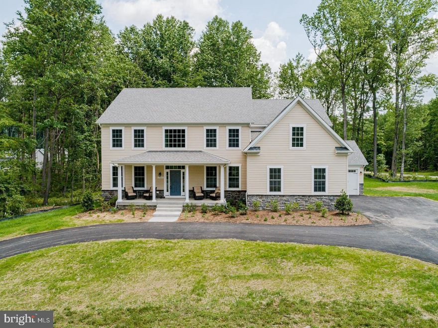 MODEL HOUSE LOCATED AT 1333 GERMAN DRIVEWAY. Come check out our model home and see yourself living at the Ridge at Patapsco Valley! Model Open Wednesday-Friday 12-2 and Saturday-Sunday 2-4. Welcome to the newest award-winning Baldwin Homes subdivision, The Ridge at Patapsco Valley. Fifteen spacious lots are available, with Lot 2 currently as The William Model. The William Model boasts a spacious, two-story foyer, formal dining room, great room, and kitchen located across the rear of the home. It also features a home office, powder room, and drop zone/mud room accessible from the garage on the first floor. Descending a few steps, you will find a large living room. Up the stairs, the primary bedroom suite includes two walk-in closets and an en-suite luxury bathroom. Four additional bedrooms, each with two full baths and a laundry room, are available on the second floor. The basement provides the potential for further living space to be finished. As this subdivision is still in development, you have the opportunity to select flooring choices, kitchen cabinetry, and other upgrades. The video and photographs provided are actual examples of Baldwin Homes William Models. However, the home featured in the video and photographs has been purchased and is a private residence, therefore, it is not open for tours. The video showcases the property under construction and highlights several optional features that can be upgraded. All photographs are of William Models constructed by the builder in other locations. For more information, please refer to the provided documents, which include the model brochure, site plan, and standard features. Currently, HOA fees are estimated.