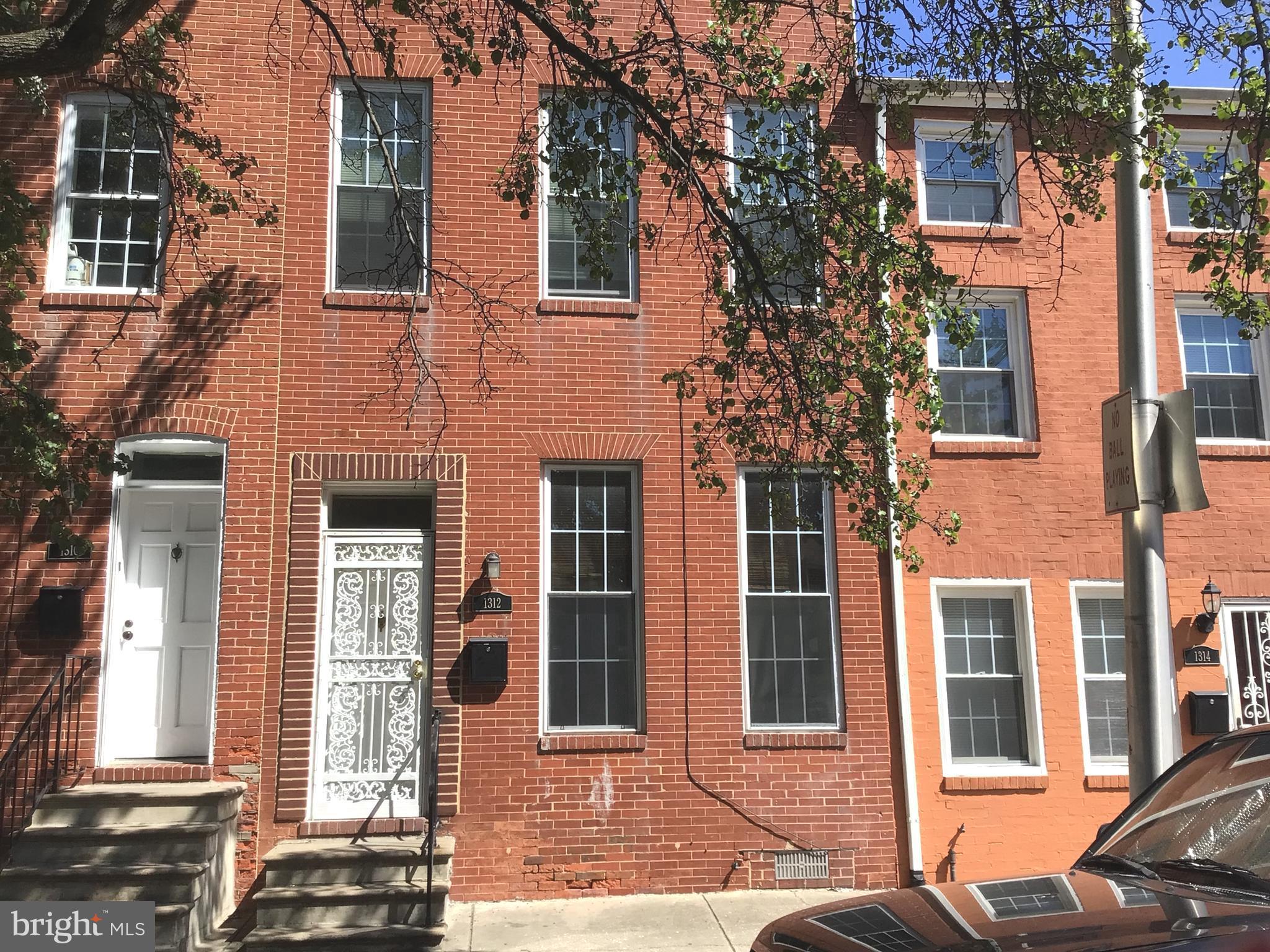 WELCOME HOME to this charming and meticulously cared-for 4-bedroom, 1.5-bath townhouse condo in Baltimore City. Step inside to a bright, open entryway with slate flooring on the main level. The updated kitchen features a new stove, recently updated refrigerator, new granite counters, and modern finishes perfect for meal prep, cooking and entertaining.
Enjoy year-round comfort with central air conditioning and peace of mind with security blinds and a secured entry door on the first floor. Upstairs, you'll find new wall-to-wall carpeting on both the second and third floors, creating a warm and inviting feel. The home also boasts an enclosed backyard for outdoor enjoyment and a full, unfinished basement offering abundant storage space.
MOVE-IN READY AND THOUGHTFULLY UPDATED, THIS HOME BLENDS COMFORT, STYLE, AND CONVENIENCE.