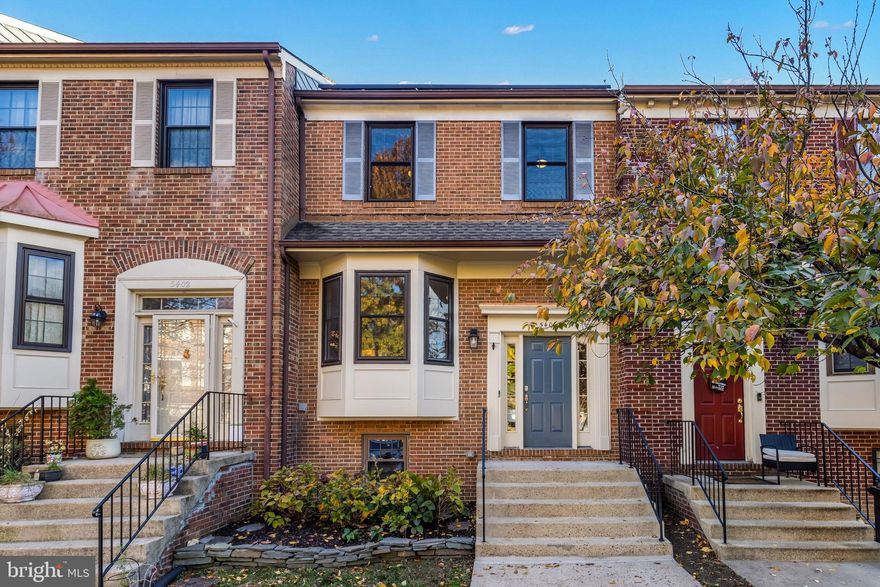 ALEXANDRIA - Updated 3-level 3BR/2.5BA brick townhouse! This well-maintained home is ready to move in with fresh paint and new carpets! The spacious main level features gleaming hardwood floors and an open sun-filled living/dining room with a gorgeous bay window. The recently remodeled kitchen features stainless steel appliances and a breakfast bar. The upper level offers three bedrooms and two updated full baths, including a generous ensuite primary bedroom with a walk-in closet. The walk-out basement includes a huge recreation room with a cozy wood-burning fireplace, a convenient half bath, and laundry/storage room. Sliding doors open to the private, fenced stone patio for entertaining or simply relaxing. Recently installed solar panels mean low energy bills! One assigned parking spot and plenty of visitor and street parking! Commuting is a breeze from this prime location near Metro bus and DASH stops, and quick access to I-395, Van Dorn  Metro (2.5 miles), and the Pentagon. The home is close to an array of shopping, dining, parks, and recreational facilities in Landmark and just a short trip to Shirlington,  Old Town, and more! Move right in and start enjoying all that Alexandria and Northern Virginia has to offer!