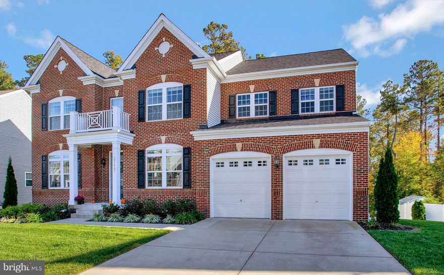 Welcome to your dream home! This Stanley Martin Kennington (elevation D) model is a true showstopper, boasting a plethora of upgrades that define modern luxury. Situated on nearly a quarter-acre lot and backing to open space, this residence offers the perfect blend of elegance, space, and natural serenity. As you step inside, you are greeted by an open foyer that flows into a formal dining and sitting area, setting the stage for gracious entertaining. The oversized living room features a cozy fireplace, perfect for those chilly evenings when you want to relax with loved ones. The kitchen is a chef's dream, complete with a sprawling island, upgraded countertops, and cabinets. An additional seating area at the island and a charming breakfast room create a welcoming space for family gatherings. Ample storage is provided by a separate pantry and numerous cabinets to accommodate all your culinary needs. A cathedral-height screened-in porch offers picturesque views of the semi-fenced yard and wooded surroundings, making it an ideal spot for enjoying your morning coffee or entertaining guests.Upstairs, the owner's suite is a haven of comfort, with a separate sleeping area and a sitting area for relaxation. The spa-like bathroom features a shower and bathtub for your personal retreat, and the oversized his & her closets provide ample space for your wardrobe. A "Mini-Master" with it's own full bath and two additional generous bedrooms offer plenty of space for family and guests- with an additional full hall bath and linen closet to serve their needs. Each bedroom has a walk-in closet too. The finished basement is a versatile space, offering a fifth bedroom, a full bath, and additional living and storage areas. The walkout provides convenient access to the yard, where you can enjoy the beauty of the outdoors. For easy maintenance, there is a whole yard, in-ground sprinkler system. You dream yard is a touch away! Situated in the highly desirable community of Wildewood, this home provides easy access to amenities, schools, and parks, making it perfect for modern living. The community parks are just a short walk away. With almost 5,700 sqft of finished living space, you won't want to miss your opportunity to make this stunning home your very own. Schedule a showing today -your dream home awaits!