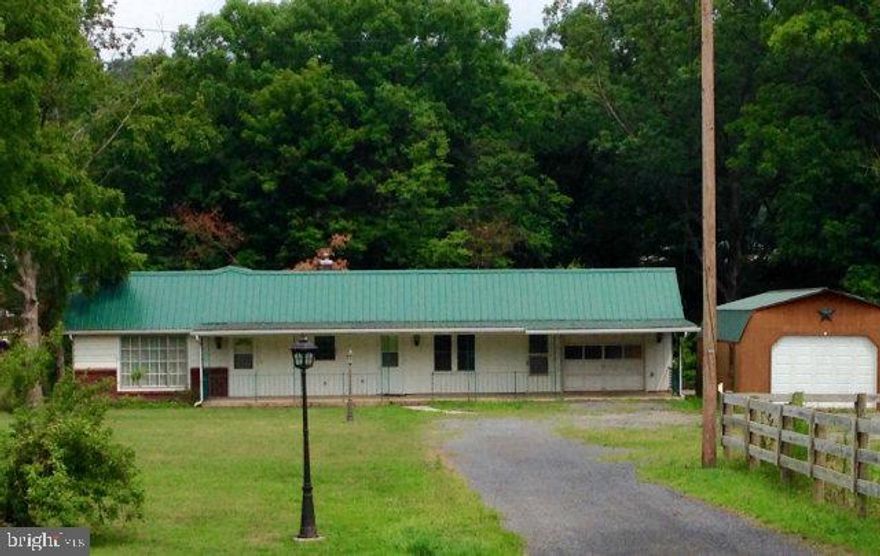 Looking for one floor living and/or a place for horses or animals?  Look no further! This updated, well-kept ranch home has 3 bedrooms, aNnoak eat-in kitchen and a large laundry room/mudroom.  The sunroom off the master bedroom is partially finished and A BRAND NEW WELL INSTALLED IN DECEMBER.  All of this on 1.51 acres with a 2 stall horse barn with feed/grain room.  Need space?  An attached 1 car garage (heated) and a detached 1 car garage are ready to house your cars, toys or farm equipment.  Call for your tour today!