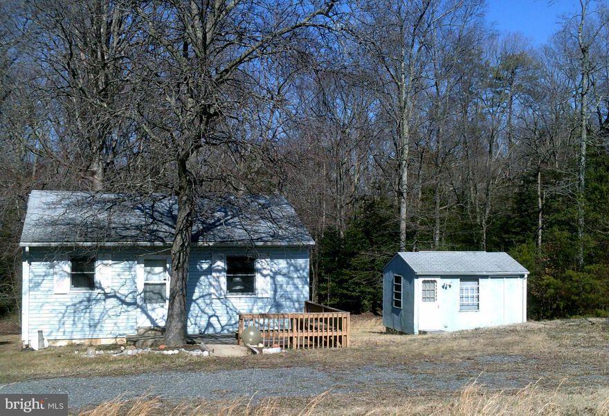 MORE affordable than renting! No Down Payment using Rural Development 100% Financing! Sellers paying ALL CLOSING and Home Warranty. Great 2 bedroom, 1 bathroom home with eat in kitchen. New carpet, tile and paint. New Well. Enjoy the serenity from the patio deck with privacy of 1.140 acres. BONUS building has electric & air conditioning; great workshop, office, studio, etc. Hurry won't last long!