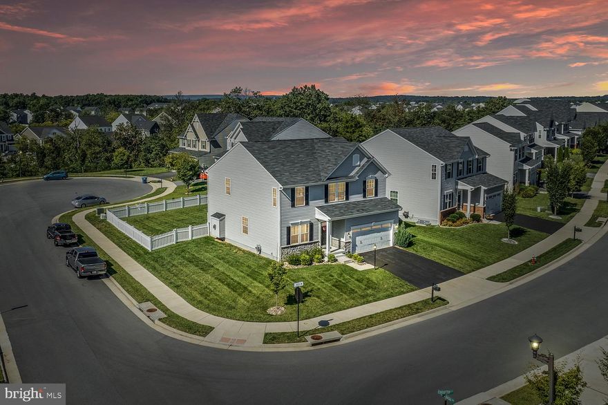 Welcome to 101 Rooftop Court in the sought-after community of Snowden Bridge! This home is stunning from the minute you walk in the front door and shows like a model! The design touches and amenities are amazing throughout, with freshly painted walls and trim work making it fresh and contemporary. There are hardwood floors throughout the main level and all-new carpet everywhere else. From the foyer, you'll see the open nature of the floor plan. The hallway leads past a formal dining room and brings you to the large family room with gas fireplace. The kitchen has an island with seating and is large enough for entertaining and room for everyone to join in the cooking. The sunroom adds additional space for large dinners or for casual meals. The maintenance-free deck and fenced rear yard make this an ideal space for get-togethers. The main level also has an office, a mudroom off the garage, and a half bath. The primary suite on the upper level is large and comfortable and features a tray ceiling and walk-in closets; this is where you'll find the privacy and solitude needed after a long day. The en-suite bath has a soaking tub, a walk-in shower, and dual sinks. There are two additional bedrooms that are large and comfortable and separated by a loft for added privacy. The loft/flex space provides an additional living area and could be used for homework, TV viewing, crafts, etc. There is a full bath as well as a laundry room on this level. The lower level includes the rec room for watching the game or playing pool, and an adjacent exercise room with luxury vinyl floors that could be a great guest room! There is also a full bath and loads of storage. You'll enjoy the community's amenities, including the in-ground pool, party center, covered tennis courts, playground, dog park, extensive walking and bike trails, the in-community elementary school, and private daycare center. Easy access to shopping and commuter Routes 81 and 7, and a short drive to both Winchester and Martinsburg. This home is move-in ready and waiting for you!