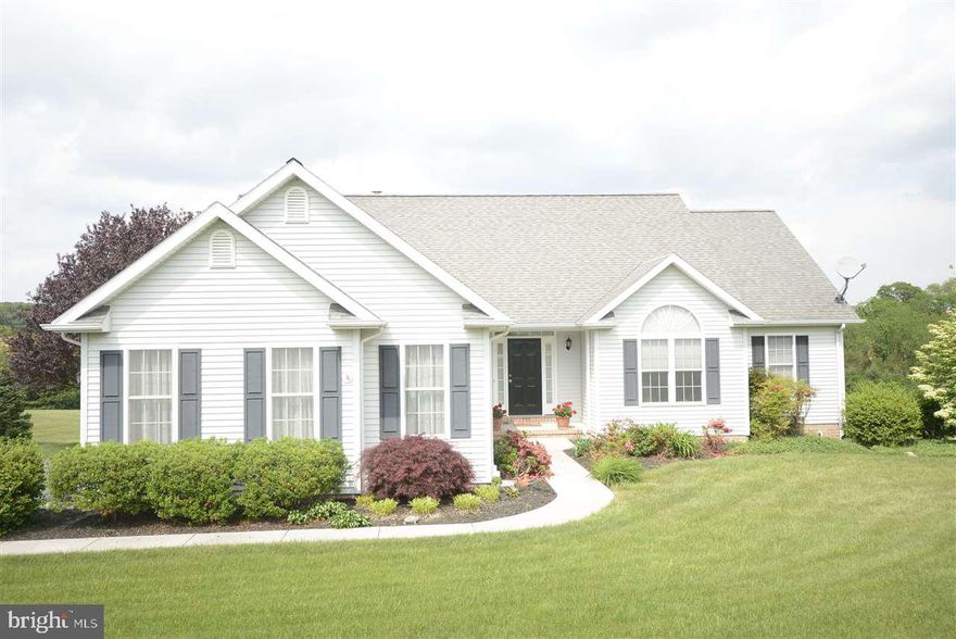 Mint Condition- over 2100 sf Living space- Vaulted Ceiling Great Room- Master Suite with whirlpool tub- Lower Level Family room with full Bath & Walkout to Paver Patio Lower level Bedroom or Office - Storage area with Shelving- 1.48 Acres in Rural Development - 3 Full Bath 4 Bedrooms - Easy access to Maryland