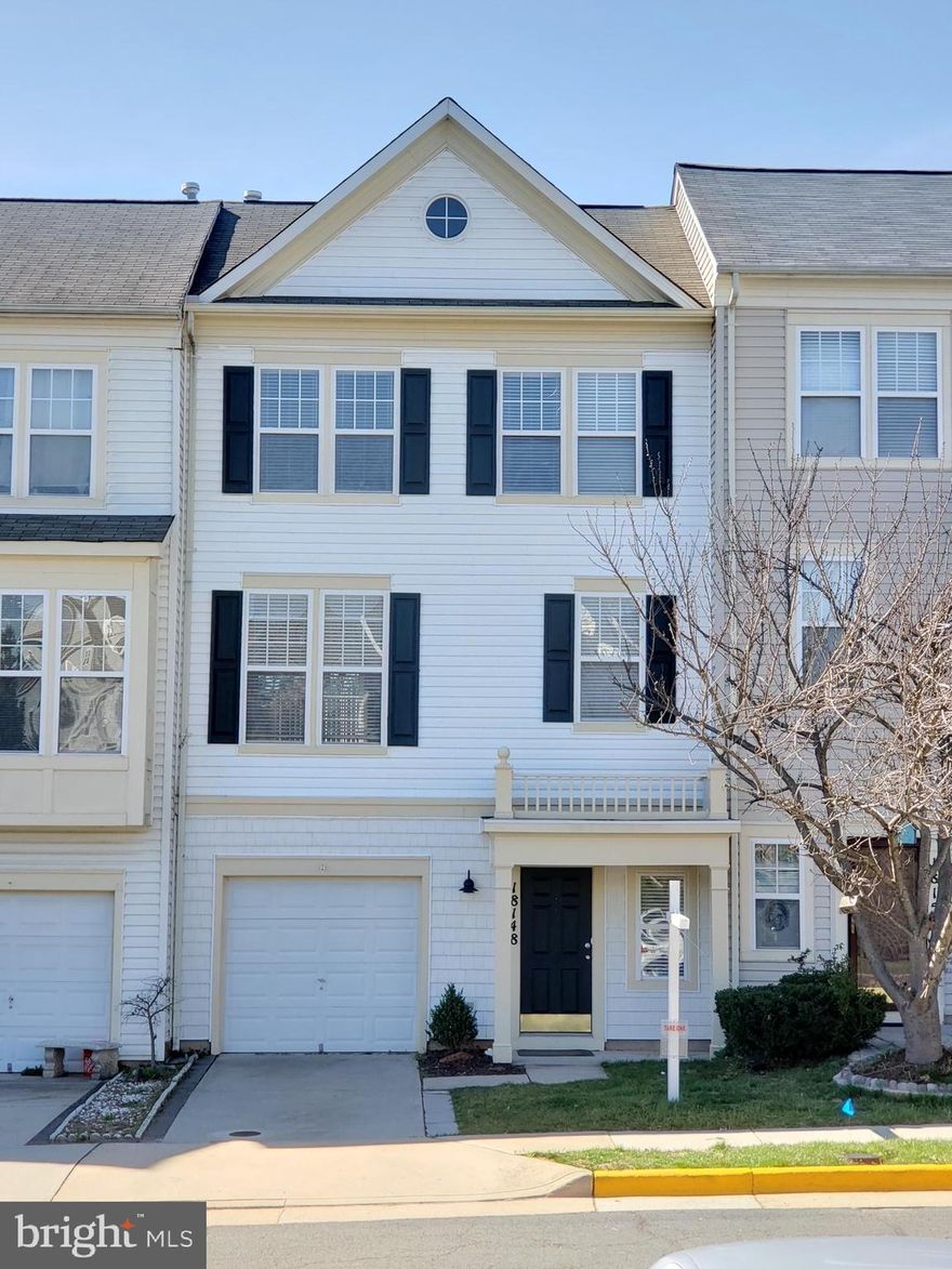 Perfectly located one car garage townhome close to shops and restaurants and walking distance to Red Rock Wilderness Park, overlooking the Potomac River. Beautifully maintained and updated 3 bedroom, 2 full and one half bath. Beautiful 6" hardwood floors throughout the two main levels. Gourmet kitchen with stainless steel appliances, sink with upgraded faucet and glass tiled backsplash. Maple cabinets with granite countertop and eating bar. Nice outdoor deck overlooking fenced yard and trees. Upper bedroom level with newer upgraded carpet and padding. The 2 full baths had been updated with new vanities and flooring. HVAC system with NEST thermostat . Large one car garage with ample guest parking across from home. Community offers outdoor pool, tennis courts basketball courts, tot lots and minutes to shopping and main roads.