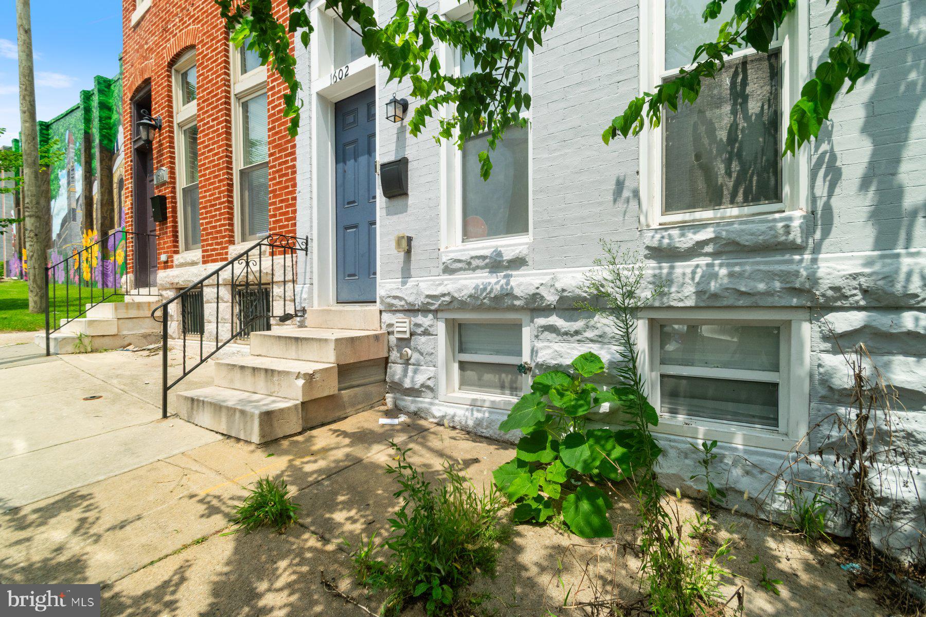 Stunning Renovated 4BR/3.5BA Home with Two Primary Suites – Prime Location Near Johns Hopkins Hospital! Welcome to this beautifully renovated 4-bedroom, 3.5-bathroom home that blends modern luxury with timeless charm. Perfectly situated within walking distance to Johns Hopkins Hospital, this property is ideal for homeowners and savvy investors alike—offering excellent potential for renting to traveling nurses, doctors, or medical interns. Step inside to discover an open-concept main level adorned with recessed lighting, elegant chair railings, and crown molding, creating a warm and sophisticated atmosphere. The living room boasts a uniquely designed decorative ceiling and a gorgeous stone accent wall with a built-in fireplace, making it a stunning focal point for relaxing or entertaining guests. The modern kitchen features sleek stainless steel appliances, ample cabinet space, and a layout designed for both functionality and style. With two spacious master suites, including one on the upper level and another on the lower level, this home offers flexible living arrangements for multi-generational households or rental opportunities. The finished basement provides additional living space—perfect for a recreation room, home office, or guest suite. Whether you’re looking to settle into a beautifully upgraded home or invest in a high-demand rental opportunity in a prime location, this property offers unlimited potential. Don't miss your chance to own this must-see gem—schedule your private tour today!