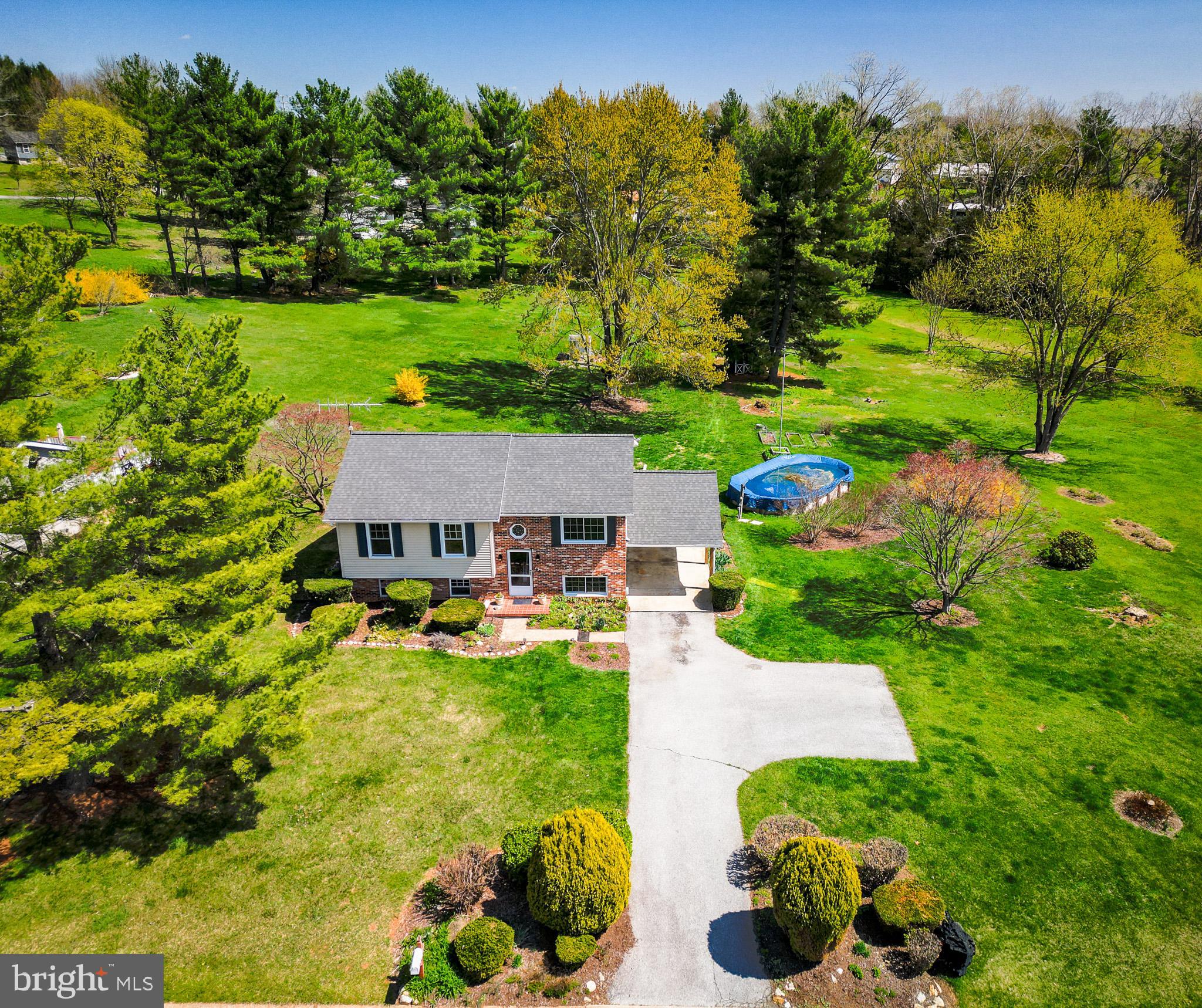 OFFER DEADLINE: Wednesday, April 16th at 12pm!
Welcome to 195 Phillips Drive, located in the desirable Wolf Hill neighborhood. This beautifully maintained home features three spacious bedrooms upstairs, plus a versatile lower-level room that can serve as a fourth bedroom, home office, or playroom—perfect for today’s flexible living needs. The upper level boasts new carpeting, recent luxury vinyl plank flooring in the kitchen, and stunning quartz countertops that bring a fresh, modern touch to the space. Downstairs, you’ll find a cozy family room, a convenient laundry area, abundant storage, & an additional powder room. Enjoy the nearly 1.5 acres of outdoor space from the patio or the rear deck overlooking the above-ground pool ideal for relaxing or entertaining. The property also includes an attached carport, an additional parking pad, 2 sheds, a new roof, and recently replaced windows for added comfort and peace of mind. Don’t miss your chance to own this move-in-ready gem in one of the area’s most charming neighborhoods