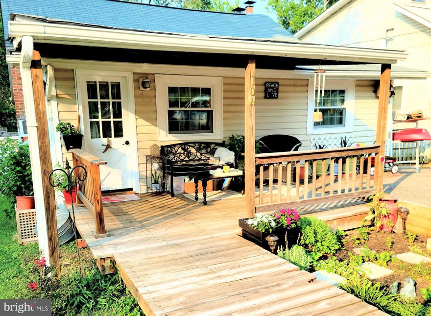 Charming home in Riva offers two bedrooms and a bath upstairs. Also has another bedroom and full bath downstairs for an in-law/young adult apartment. There are 2 separate electric meters. Upstairs has updated kitchen with new quartz countertops, stainless steel appliances, peninsula/island with seating that's countertop height and space for 3 barstools plus bamboo flooring. The bathroom has been recently updated. Wood Fireplace for those cool winter evenings with matching quartz surround and a double mantle. All the lighting and ceiling fans have been updated. Bathroom has luxury vinyl flooring. Kitchen cabinets with stainless steel pullout racks. Downstairs apartment has all updated LED lights as well as a new fridge, kitchen cabinets, dishwasher, luxury vinyl flooring, and a stackable washer and dryer.  Professional mature landscaping to include raspberry bushes, dwarf crape Mrytle bush, knock out roses, rose tree & clematis on fence.  All this located in Sylvan Shores is a water privileged community that offers a renovated clubhouse, 2 docks and 2 boat ramps, 2 kayak racks a swimming pier, basketball court, and a baseball field