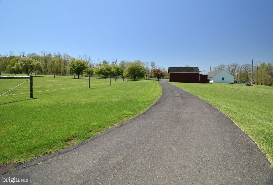 Original Mergenthaler House c. 1859.      Set on 41.45 Acres and set far back from Stump and Schlenz Hill Rds. lies this beautiful, serene, private and pastoral property; the perfect place to live and/or farm!  Nothing to compare it to for this price in the Central Bucks area that is as comprehensive with so many possibilities to offer.  The property consists of a "vintage farmhouse", a separate detached updated and 2bed/2 bath carriage/guest house, detached storage room two-car garage, inground pool, 5 stall horse barn, and a pond and large red barn most buildings are serviced by a Generac generator.   All structures are routinely cared for and well-maintained for their function and form.  Pure and Simple with the possibility to have a self-sufficient old-fashioned farm.  Numerous Wildlife includes turkey, deer,
owl, fox, turtles and fish in the pond and more!!-just a beautiful nature sanctuary for the eye  
Added features include newly installed 5- foot solar powered electric fenced pastures to suit new owner's purpose to house and keep horses, a tree farm, or vineyard, or enjoy keeping animals etc.  37 Acres are Preserved (document available) in the rear of the property with a 25 acre township Conservancy directly behind this property. The farmhouse and other buildings, including the large red barn and horse barn with 6 stalls sit within a 3-acre building envelope for the buyer either renovate the well-maintained residence and/or expand it.   *The detached guest house serves as a wonderful cottage with a relaxing porch, 2 bedrooms/ 2 bathrooms, a nice kitchen, fireplace, and laundry room.   In addition, there is a detached office space with adjacent two-bay garage.    A very charming, quintessential small farm in a beautiful, private setting.