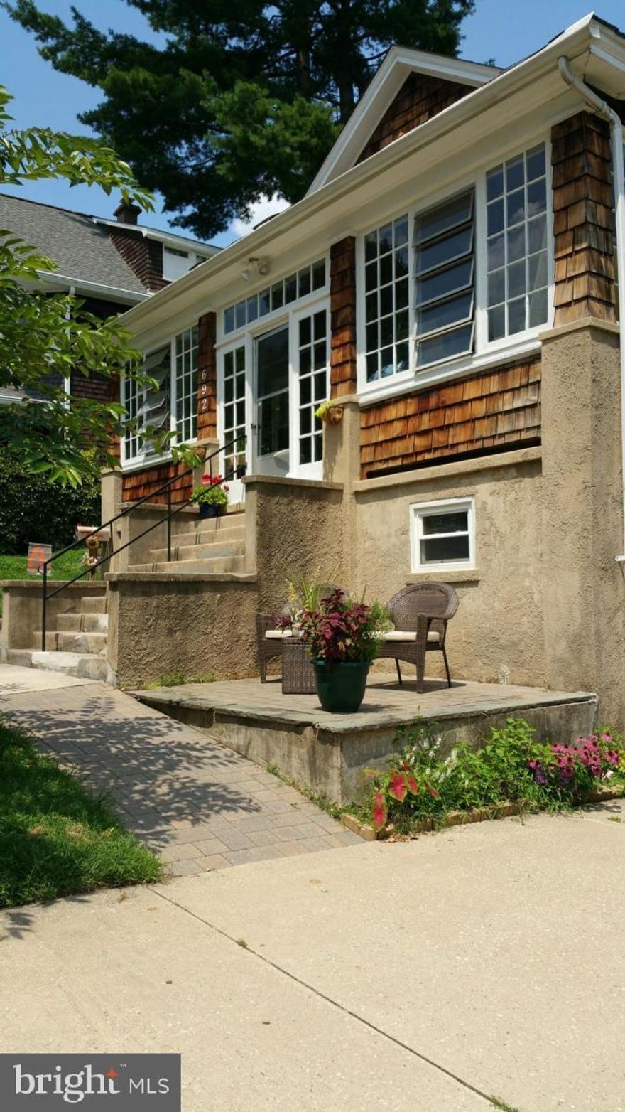 Charming 2 BR apartment on quiet street in Roland Park with great views! Private side entrance to this freshly painted second floor apt with stainless kitchen appliances and updated cabinets/countertops. You will appreciate the hardwood floors, sunny rooms and  your own washer/dryer.  Bonus room could be office or small guest bedroom. Shared use of beautiful outdoor space, both patio and yard with only a short stroll to Stoney Run trails. 2 off street parking spaces available to you. Walking distance to Eddie's supermarket, the library, post office and just five minutes to hip Hampden!