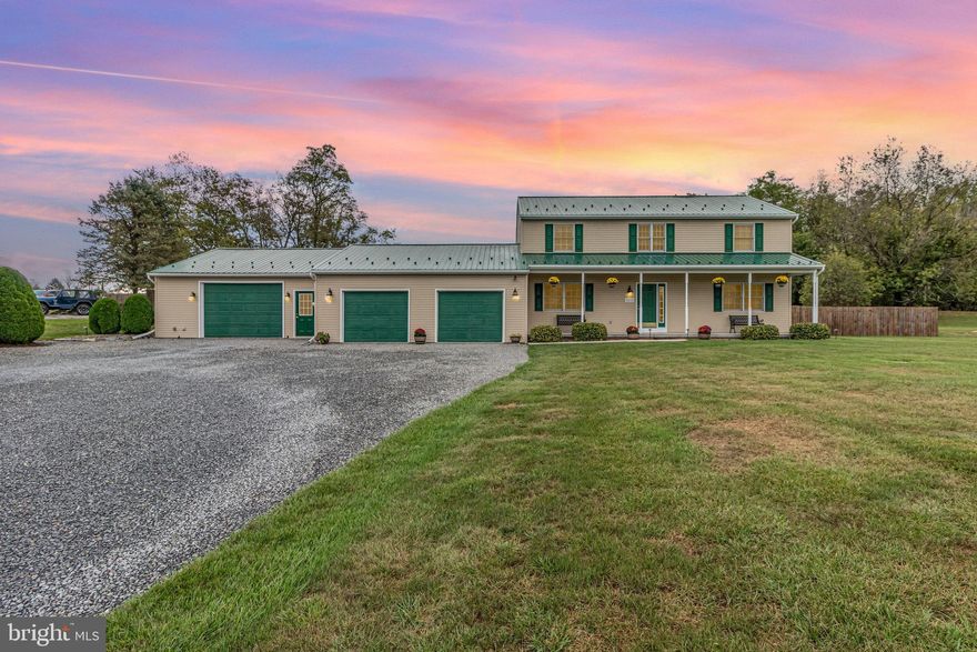 Welcome to 2472 Ritner Highway, a lovely 3-bedroom, 2.5-bath home on a full acre in a peaceful country setting. This spacious property features a steel roof installed in 2022, bright two-story foyer, a media room, and a four-season sunroom with a remote-controlled fan and lighting. Outdoor living is just as inviting with a deck and patio. Inside, you'll find thoughtful upgrades throughout – central vacuum system with outlets in both garages and kitchen island, built-in night lights with timers, a full security system, and pre-wired TV and speaker connections in multiple rooms and the garage. The home also includes a dedicated room wired for sound – perfect as a TV or bonus room.
The attached garages are a standout feature, offering insulation, paddle fans, wall cabinets, workbench, cable/TV hook-ups, hot water sink, vacuum, air compressor lines, generator hookup, welder receptacles, heat and A/C unit in the big garage, and RV hookup. A large rear shed with garage door plus a smaller storage shed both have electricity – one also includes a TV line. Exterior highlights include dusk-to-dawn lighting, spotlight at the flagpole, power to a former pool site, low-voltage landscape lighting, and switch-operated front porch outlets for holiday lights. Rear porch is wired for radio speakers, and the home is hot tub ready. Truly a rare find that combines comfort, utility, and space – perfect for hobbies, entertaining, and everyday living. Schedule your private showing today!