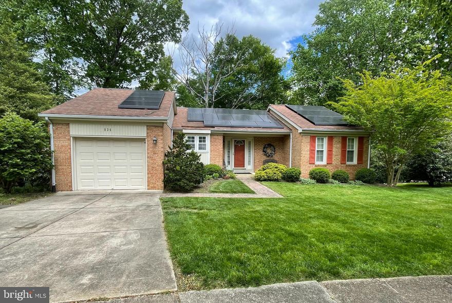 Price Adjustment and the seller is willing to credit the buyer $8,175.00 for the removal of the wallpaper and repainting of the walls.  Golfer's Ridge! This two-level brick single family home is located at the end of a cul-de-sac, backs to the woods and has a total of approximately 2,228 sqft. With the addition of a sunroom and large rear deck facing the woods you may find yourself watching nature most days. All of the bedrooms and bathrooms are conveniently located on the main level with an unfinished lower level that has walkout access to a rear patio and fully fenced rear yard. Solar panels are owned and convey with the sale. HVAC replaced in 2017, Sunroom mini split HVAC installed in 2021. No polybutylene detected in the home however this needs to be verified by a home inspector or plumber.  Heritage Harbour offers many amenities and activities. The center of community activities is the Community Lodge, which features an auditorium, indoor and outdoor pools, fitness center, library, recreational activities room, woodwork shop, and many rooms for meeting and college courses. Behind the Lodge, the outside pool and picnic area adjoin a horseshoe pit, bocce ball court, and a walkway down to our waterfront on the South River. There is a Golf-Tennis Court-Clubhouse complex, which offer nine tennis courts, a nine-hole golf course, and a clubhouse with a pro shop and a Dining Room. A secure storage lot for RVs and boats is also located in the community.