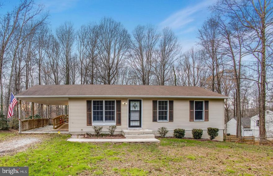 No hoa! Wonderfully spacious on over an acre, freshly painted  3  bedroom home  with 3 full baths, hardwood floors on the main level with spacious kitchen and inviting lower-level family room with new carpet. Updated roof,  Walk out lower level leading to a tranquil yard with a large shed/ garage.  Attached carport has a handicap accesible ramp.  You will love this home!