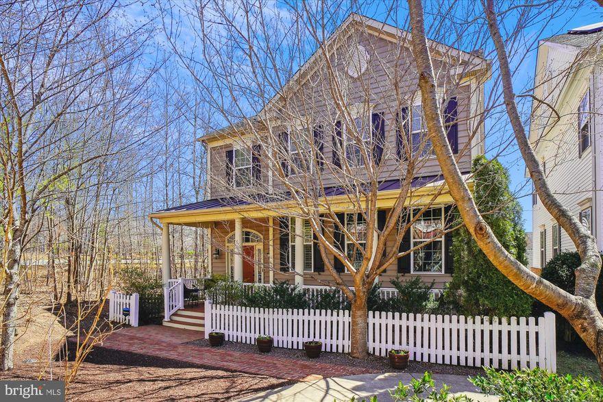 Back on the market,  new price, new carpet and enhanced the aesthetic appeal of the property. Furniture has been removed so you can envision yourself in this home and create your own design as you walk through. This beautiful home is surrounded by nature in the highly sought-after Clarksburg Village.  This Carol II model is a well maintained 5-bedroom, 3.5-bathroom home, offering over 4,000+ sq ft of open concept living space.  The front of the property boasts a full-length covered porch ideal for evening wind downs or perfect to watch kids or pets on the grassy common green area.  

Take a walk inside to a bright and airy interior, including a foyer, convenient powder room, a beautifully designed kitchen featuring hardwood floors, stylish granite countertops, gorgeous kitchen cabinets, classic black appliances and a central island. The adjacent breakfast nook, butler's pantry and connected formal dining room are an entertainer's dream. There is a beautiful deck off of the kitchen to extend the entertainment space.  The main level also includes a cozy living room and spacious family room with a gas-burning fireplace, perfect for gatherings with friends, family, or just to relax.  This home has stunning hardwood floors throughout most of the main level.  As you move to the upper level, you’ll find four generously-sized bedrooms and two full bathrooms. The primary suite is like your own getaway, featuring a spa-like bathroom with a soaking tub, a walk-in closet, and an elegant tray ceiling.  The second full bathroom is ideal for busy households.  The finished basement offers flexible living space, including a bedroom, full bathroom, a recreation room, a gym and space for storage. An outdoor walk-out back patio creates additional outdoor living space.   An attached backloading two-car garage offers space for both parking and storage.  This home also includes solar roof panels for sustainability.  

Experience the best of suburban living in Clarksburg Village, one of Montgomery County’s top-selling home communities. This well-planned neighborhood provides outdoor gathering spaces and a shopping center. Residents also enjoy amenities, including beautiful clubhouses, two pools, and playgrounds for kids, plus 13 acres of ball fields and scenic greenway trails for walking and running. Conveniently located near Clarksburg Village Center, Route 27, the Gaithersburg Metro, and Germantown MARC station, with quick access to I-270. Enjoy shopping and dining experiences at the Clarksburg Premium Outlets and Milestone Shopping Center.  This home won't last long!  Don't wait to get your blend of charm and modern within one neighborhood.