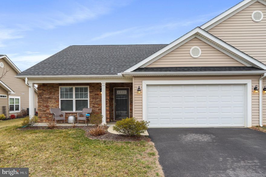 Large and lovely this gorgeous Stone fronted Villa is turnkey and immaculate. Boasting 1641 square feet this home is comfortable, quiet and South facing enjoying hours of natural light. Two very large bedrooms and 2 large full baths; one on either side of the living space offer privacy and respite. Luxury vinyl floors throughout the entire home are tough as nails and clean easily. With trayed ceiling, bank of windows and double walk-in closets, this Master suite with En suite is tranquil and perfectly proportioned. Experience the ultra-flexible Open floor plan with generously sized family, kitchen and dining room. Gleaming stainless-steel appliances, large kitchen island with room for seating, and a double doored pantry complete this open kitchen with miles of countertops. Need a little quiet space outdoors? Relax in the screened-in back porch or garden in the raised beds. Separate spacious laundry room has oodles of storage and is just off the kitchen. An oversized garage has room for cars, bikes and extra storage. You might even have room for a craft area or DIY workbench. This much sought after large Villa model in Spring Mills is just off Rte 81. Nearby is a variety restaurants and retail stores. Open House Saturday, February 17th 1:00-3:00 PM. Questions? Call Listing Agent Mary Garnett Ratchford