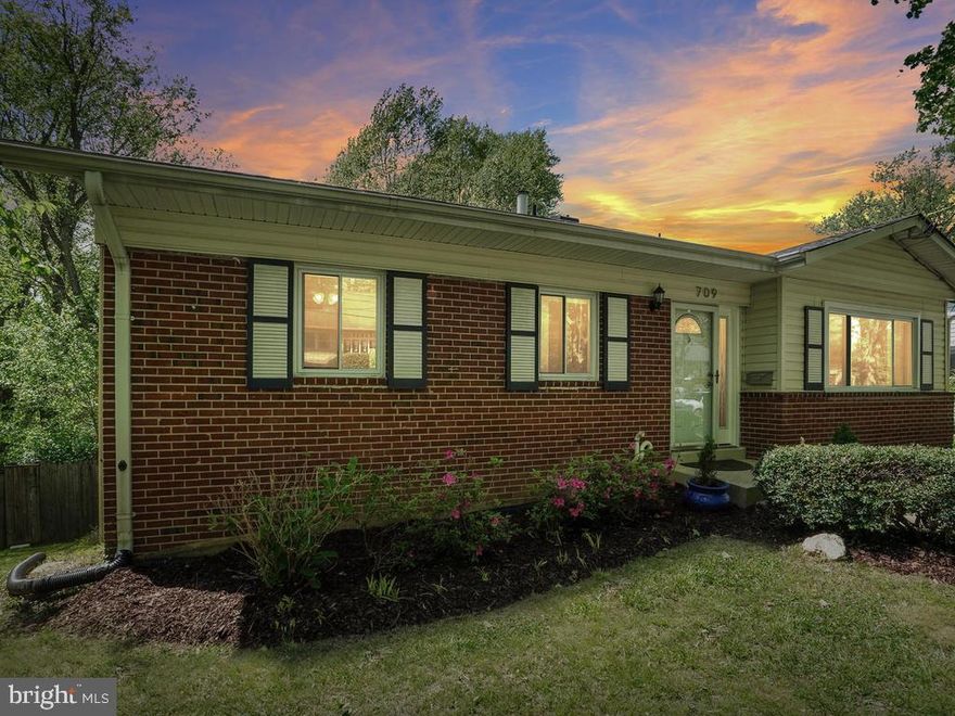 This beautiful brick front ranch home has it all! Conveniently located in Rockville's Hungerford community, this warm and welcoming home is close to fantastic amenities. Near three amazing playgrounds and parks! Walk to the nearby community center, Rockville Town Center, the farmer's market, restaurants and the library. Recently renovated and freshly painted, this home has upgrades galore! Enjoy cooking in the gourmet kitchen with granite counters, custom cabinets, stainless steel appliances and custom backsplash. The light-filled living room has views of the large, flat, fenced backyard and features gleaming hardwoods that continue into the three main level bedrooms. The Master bedroom suite has a renovated Master bathroom with a custom tile shower. Plus, two more spacious main level bedrooms and a renovated hall bath! Entertain in the light-filled lower level with a recreation/living area, extra-large bedroom, half bath and two large storage areas! Walk out from the lower level to the deck and spacious backyard--perfect for working in the garden plot or for playing sports! All this, plus a large backyard storage shed. Brand new elementary school with a Chinese immersion program, too! This lovely home won't last long!