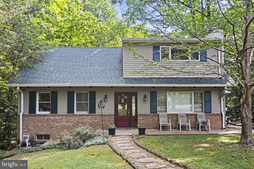 Sometimes great homes circle back at just the right moment- and this is your chance!  Charming Cape Cod on Over 5 Private Acres with Massive Detached Garage & No HOA!

Discover the charm of country living in this character-filled Cape Cod, nestled on over 5 private, wooded acres—a rare find with no HOA and endless potential. Built in 1974, this home combines rustic appeal with key updates, offering the perfect canvas for your personal touch.

Inside, you’ll find 5 spacious bedrooms, 2 full bathrooms, and over 2,800 sq ft of living space. Warm pine wood beam ceilings run through much of the home, adding a timeless, cozy feel. The kitchen and bathroom cabinets have been tastefully updated, featuring granite countertops, newer appliances, and undercabinet lighting. Other recent improvements include NEW septic system, LVP flooring, new carpet, fresh paint, and a newer roof.

The eat-in dining area opens to a composite deck overlooking the peaceful backyard—perfect for outdoor dining, entertaining, or relaxing in nature.

Downstairs, a partially finished basement with wet bar and granite countertop  and rough-in plumbing for a half bath, is ready for your vision—ideal as a recreation space, home gym, or additional storage.

Outside, the true showstopper is a two-story,  2,400 sq ft detached 2-car garage/workshop, formerly a two-stall barn with a loft. Complete with electric and skylights, this versatile space is ideal for hobbyists, mechanics, or home-based businesses.

If you're looking for space, privacy, and flexibility, with the chance to build equity through future updates, this is your opportunity. With a private, tranquil setting and no HOA, this property offers freedom that’s hard to find in such a centrally located part of Saint Mary's County.

Don’t miss the chance to make this peaceful country escape your forever home!