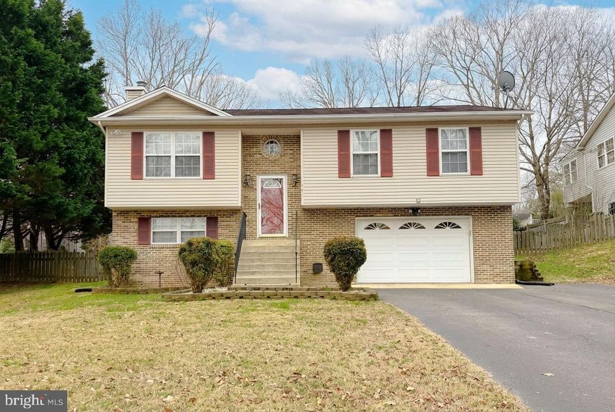 Welcome to 221 Pawnee Ln, a charming home that is move-in ready in Chesapeake Ranch Estates. The Chesapeake Ranch Estates has so much to offers and more. It includes a community playground, exclusive bay, beach, lake, and air strip access just in time for summer. This 3 Bedroom home provides cathedral ceiling's  in the kitchen and living room. All stainless steel kitchen appliances have recently been updated. In addition to a new water heater. All new central air and heat pump installed 2022. Enjoy a finished basement with walk out access that can be used as a 4th bedroom, In-law suite, office or easily converted to an apartment for income. This property includes an oversized garage with a work bench. It is just minutes away from Solomons Island with waterfront marinas, museums, boardwalks, restaurants, parks and shopping. Also, quick access to the Patuxent River Air Station and Saint Mary's County which offers the convenience of eateries and shopping.