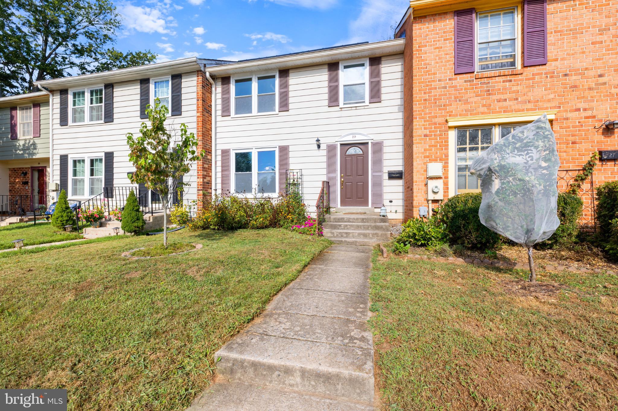 Welcome to this freshly updated move-in ready home nestled in the prestigious Farmingdale Estates. With over 1700 square feet of thoughtfully designed living space, this residence offers 3 bedrooms and 1.5 bathrooms. Step inside to discover a traditional floor plan that seamlessly flows from room to room, accentuated by stunning hardwood and laminate plank flooring that exudes warmth and luxury. The home has been updated throughout with new flooring, paint, and quartz countertops, roof and solar panels! The large primary bedroom offers spacious closets and a private bathroom vanity. Two additional bedrooms offer versatility, whether for guests, a home office, or personal hobbies, ensuring that every inch of this home is utilized to its fullest potential. The basement is a hidden gem, offering ample space for a workshop or the opportunity to create additional rooms tailored to your lifestyle. This versatile area can be transformed into a personal sanctuary, a fitness space, or a vibrant entertainment zone, limited only by your imagination. Outside, the property boasts a large fenced back yard. Two assigned parking spots ensure convenience and ease of access. Don't miss the opportunity to make this stunning townhouse your own and elevate your living experience to new heights. Embrace the elegance and sophistication that awaits you in this exceptional property.