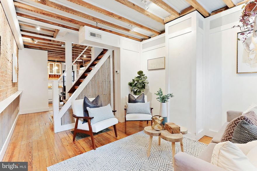 This home has all of the charm! The location of the property makes for a very low traffic and secure feel as it is tucked back on Knox Court and not located on a main street or road way. The custom wainscoting, exposed brick, exposed original wooden ceiling beams, and fixtures give this home more charm than your average row home. Knox Court is a true diamond in the ruff. Starting from the front door you will enter into the living room and past the stairs that lead to the upper level you will find the kitchen. Off of the rear of the kitchen is access to the main level back patio. The basement entry is also off of the rear kitchen under the main stairs. The basement is fully finished and offers a great space for an office as well as a second entertaining area with an updated half bathroom for convenience. The upstairs has one bedroom on the from of the home and one on the rear (2 bedrooms) and a Jack and Jill bathroom shared between both bedrooms. Off of the rear of the rear bedroom there is a Florida room offers plenty of natural light for plants or can be used as a second office. Thats right, there is space for two offices in this home! The roof deck access hatch is located in the Florida room ceiling. Enjoy sweeping city and water views from the roof deck. Come by and tour this rare gem!