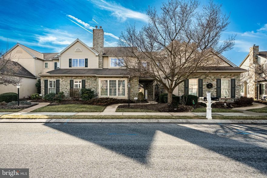 Welcome to 435 Laurel Ridge Path located in the exeptional 55+ community of Honeycroft Village!  This well-appointed 3-bedroom, 2.5-bath Primrose model offers maintenance-free living with a thoughtfully designed layout highlighted by a first-floor primary suite featuring a walk-in closet and a spacious primary bath with tile flooring. The open floor plan is enhanced by 9-foot first-floor ceilings, a living room with fireplace, a formal dining room with hardwood flooring, and a kitchen with upgraded 42" cabinetry. Residents enjoy access to an exceptional array of community amenities, including approximately 60 acres of open space, walking trails, a community center with indoor pool, outdoor patio areas, fitness center, and a great room with fireplace, among many others.