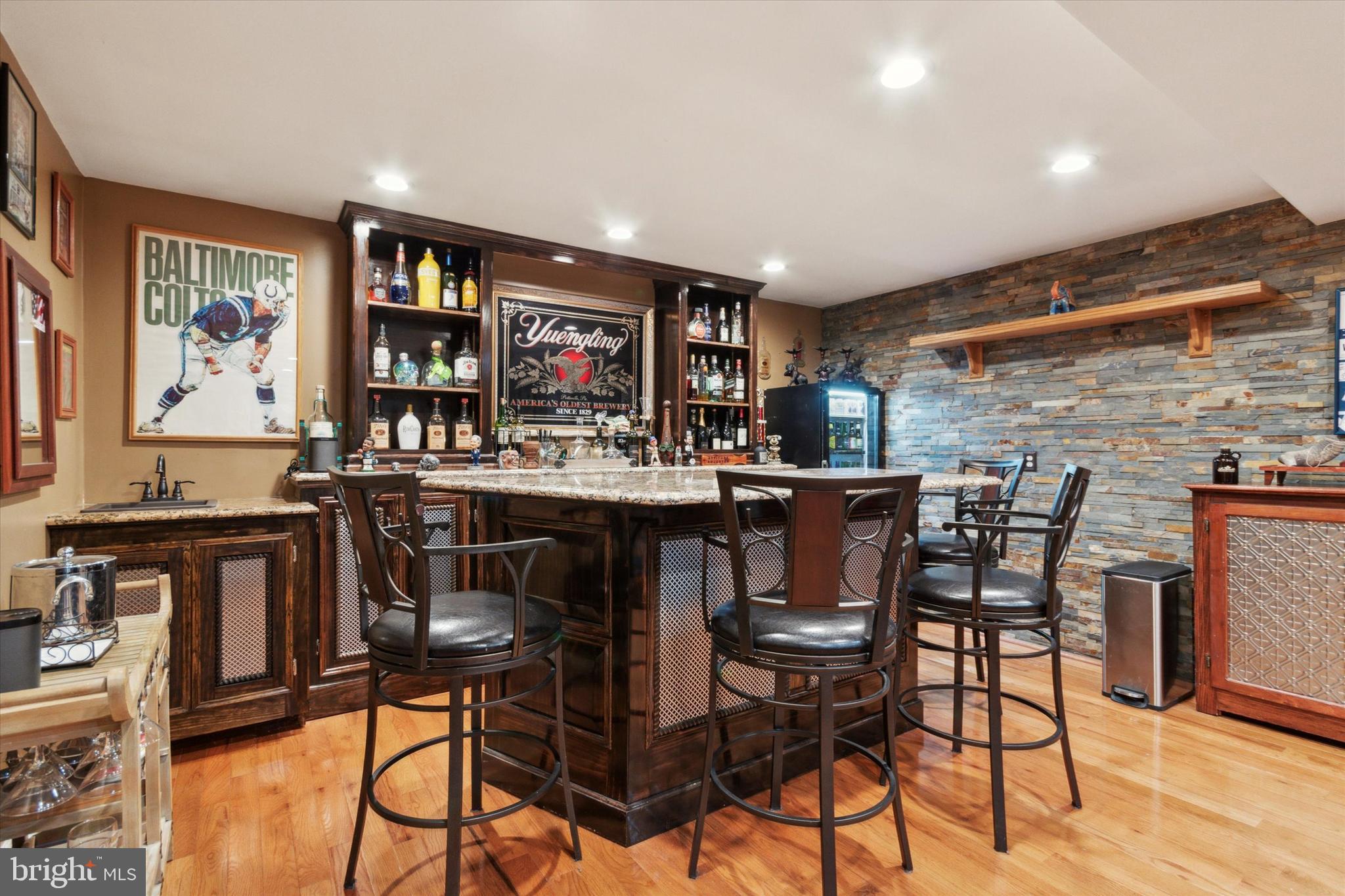 Welcome to 2534 East Somerset St, where luxury meets income potential! This exceptional duplex exudes elegance with its brick exterior and exclusive private street parking, setting the stage for a truly remarkable living experience. Step inside and prepare to be mesmerized by the first-floor unit, a haven of sophistication and style. The at-home fitness center beckons you in with its sleek design and abundant closet space. The master bedroom is a sanctuary, boasting oak hardwood floors, recessed lighting, and a ceiling fan, leading to a spa-like master bath with a mahogany vanity and exquisite tiled 3-piece bathroom. The living room is a masterpiece unto itself, adorned with mahogany bookshelves and captivating artistic tile walls. The gourmet kitchen is a culinary delight, featuring granite countertops and rich walnut cabinets, with every detail meticulously crafted to perfection. The second bathroom is a tranquil retreat with floor-to-ceiling tile in the stand-up shower. Step outside into your private paradise, where a large living room awaits with hand-crafted stone walls, a cozy gas fireplace, a rejuvenating hot tub, and a private bar that will leave your guests in awe. This space is a haven for relaxation and entertainment, providing the ultimate escape from the everyday hustle and bustle. The second-floor unit offers its own unique charm, with a cozy master bedroom, a master 3-piece bath with a mahogany sink, and hardwood flooring exuding warmth and comfort. The second bedroom is equally inviting, leading to a spacious living room area with a beautifully designed bathroom showcasing neutral paint tones and artistic tile flooring. The kitchen is a chef's dream, boasting rustic oak cabinets and elegant granite countertops that invite you to create culinary masterpieces in style. This property is a rare gem, meticulously designed with attention to detail and offering two distinctive living spaces in one of Philadelphia's most sought-after neighborhoods. Do not miss the opportunity to make this income-producing masterpiece your own - schedule your viewing today and prepare to be captivated by the unique beauty of this extraordinary home.