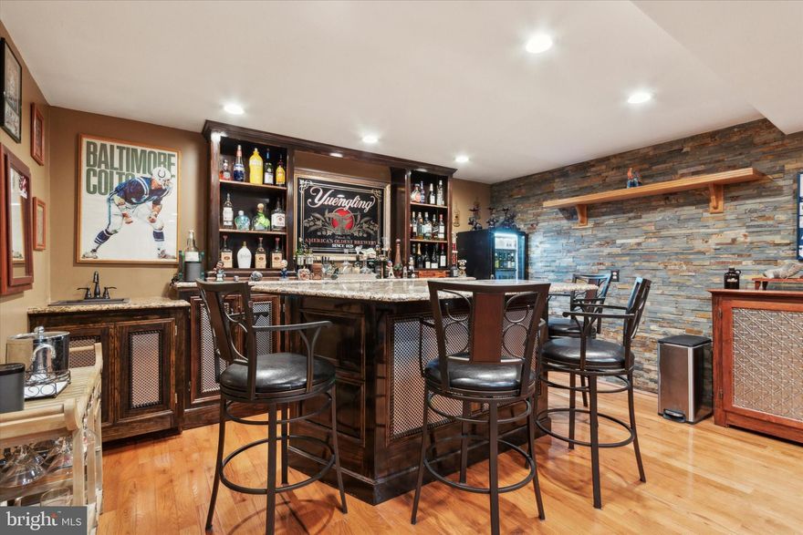 Welcome to 2534 East Somerset St, where luxury meets income potential! This exceptional duplex exudes elegance with its brick exterior and exclusive private street parking, setting the stage for a truly remarkable living experience. Step inside  and prepare to be mesmerized by the first-floor unit, a haven of sophistication and style. The at-home fitness center beckons you in with its sleek design and abundant closet space. The master bedroom is a sanctuary, boasting oak hardwood floors, recessed lighting, and a ceiling fan, leading to a spa-like master bath with a mahogany vanity and exquisite tiled 3-piece bathroom. The living room is a masterpiece unto itself, adorned with mahogany bookshelves and captivating artistic tile walls. The gourmet kitchen is a culinary delight, featuring granite countertops and rich walnut cabinets, with every detail meticulously crafted to perfection. The second bathroom is a tranquil retreat with floor-to-ceiling tile in the stand-up shower. Step outside into your private paradise, where a large living room awaits with hand-crafted stone walls, a cozy gas fireplace, a rejuvenating hot tub, and a private bar that will leave your guests in awe. This space is a haven for relaxation and entertainment, providing the ultimate escape from the everyday hustle and bustle. The second-floor unit offers its own unique charm, with a cozy master bedroom, a master 3-piece bath with a mahogany sink, and hardwood flooring exuding warmth and comfort. The second bedroom is equally inviting, leading to a spacious living room area with a beautifully designed bathroom showcasing neutral paint tones and artistic tile flooring. The kitchen is a chef's dream, boasting rustic oak cabinets and elegant granite countertops that invite you to create culinary masterpieces in style. This property is a rare gem, meticulously designed with attention to detail and offering two distinctive living spaces in one of Philadelphia's most sought-after neighborhoods. Do not miss the opportunity to make this income-producing masterpiece your own - schedule your viewing today and prepare to be captivated by the unique beauty of this extraordinary home.