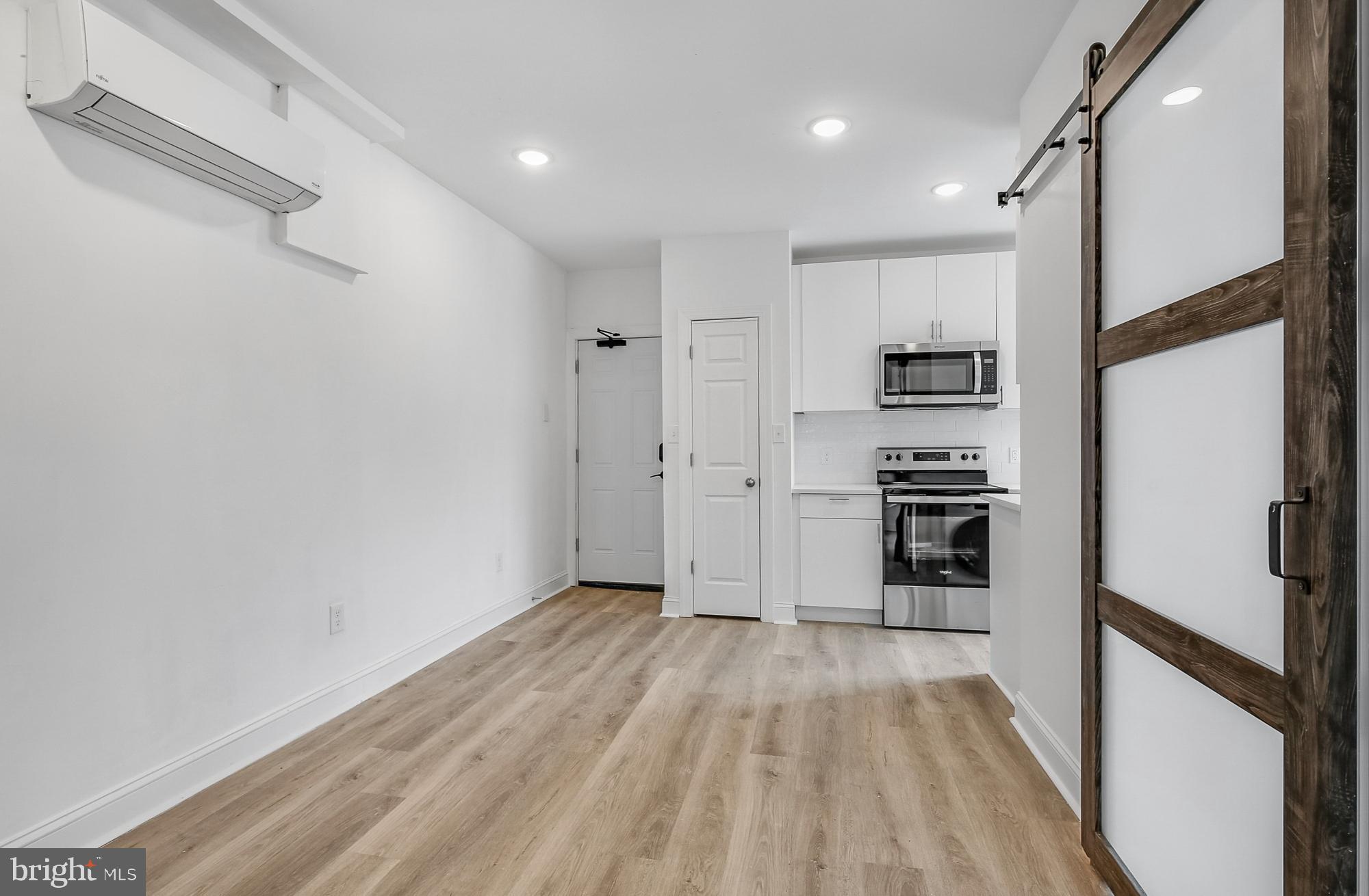 A physical tour is required before applying. Sight unseen applications will not be considered. Available NOW: 2046 E Huntingdon St embraces a minimalist approach to city living in the heart of vibrant East Kensington. This professionally managed building offers six micro-units designed with simplicity and purpose in mind. Unit #2F is a 2 bedroom, 1 bathroom apartment on the second floor with a galley kitchen and great sunlight. Each unit features ductless mini-split A/C systems, wood floors, recessed lighting, and clean finishes throughout. Open floor plans and modern fixtures create a bright and functional space, while keyless entry provides added security and ease. The efficiency kitchens are outfitted with white shaker cabinets and stainless steel appliances, offering both style and practicality. Contemporary bathrooms showcase floating vanities, medicine cabinets, and glass shower stalls with rain shower heads and detachable shower heads for a spa-like experience. Some units feature built-in Murphy beds, while others include combined washer/dryer combos for your convenience. At 2046 E Huntingdon St, function meets form in a space that keeps life simple and stress-free. Call for a tour today!
Lease Terms:
Generally, 1st month, 12th month, and 1 month security deposit due at, or prior to, lease signing. Other terms may be required by Landlord. $55 application fee per applicant. Cats and small dogs 35lbs and under are conditional on owner's approval and may require an additional fee, if accepted. (Generally, $500/dog and $250/cat). Strictly no pets over 35 lbs. Tenants responsible for: electricity, cable/internet, and flat monthly water fee ($35 for Studios, $60 for 2BRs). Landlord Requirements: Applicants to make *3x the rent in monthly gross income*, 2 paystubs, tax return must be submitted with all rental applications, credit history to be considered (i.e. no active collections), no evictions within the past 4 years, and must have a verifiable rental history with on-time rental payments. Exceptions to this criteria may exist under the law and will be considered.