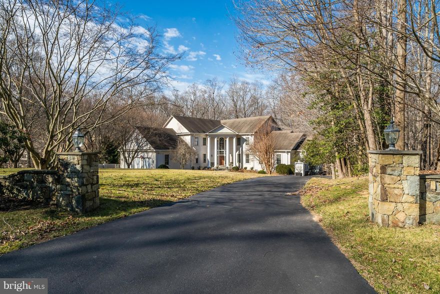 Exquisite Great Falls estate. Resting on 2 acres, this home features 6 Br, 6 Ba, 2 half BA, nearly 6,800 SF above grade plus a finished basement that includes a fully equipped secondary kitchenette, game room, exercise room and multiple guest rooms. Features include a beautiful view of the woods, grand 2-story entry, significant upgrades & beautiful details throughout. Very energy efficient home.